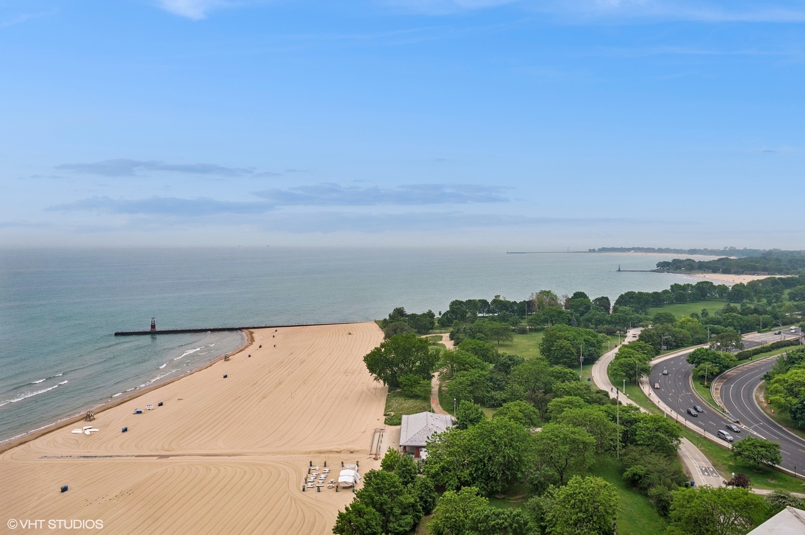 5757 North Sheridan Road, Unit 20J Chicago, IL 60660 - Photo 16 of 20 an aerial view of beach and residential houses with outdoor space