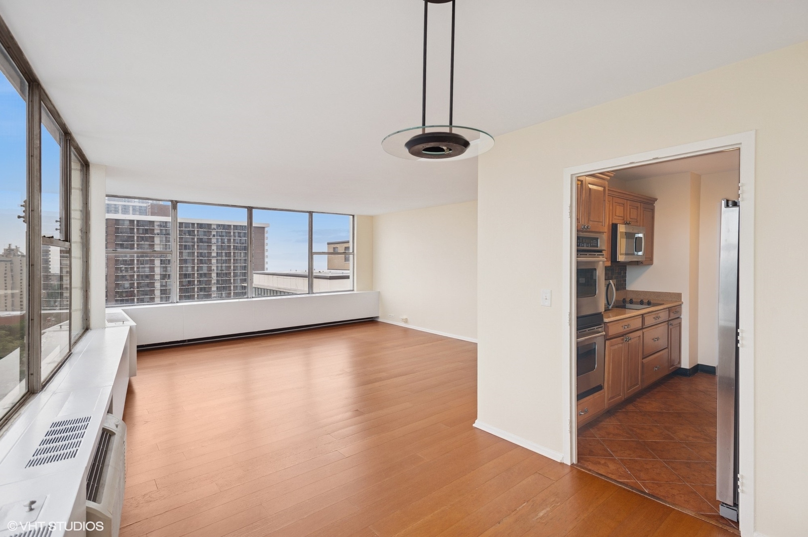 5757 North Sheridan Road, Unit 20J Chicago, IL 60660 - Photo 2 of 20 a view of an empty room with a window