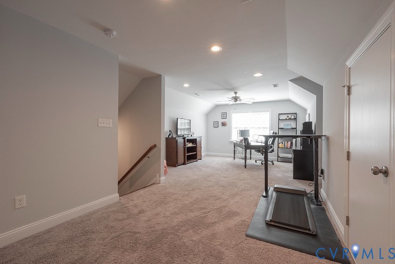 9425 Marie Road New Kent, VA 23124 - Photo 28 of 55 a room with furniture and wooden floor