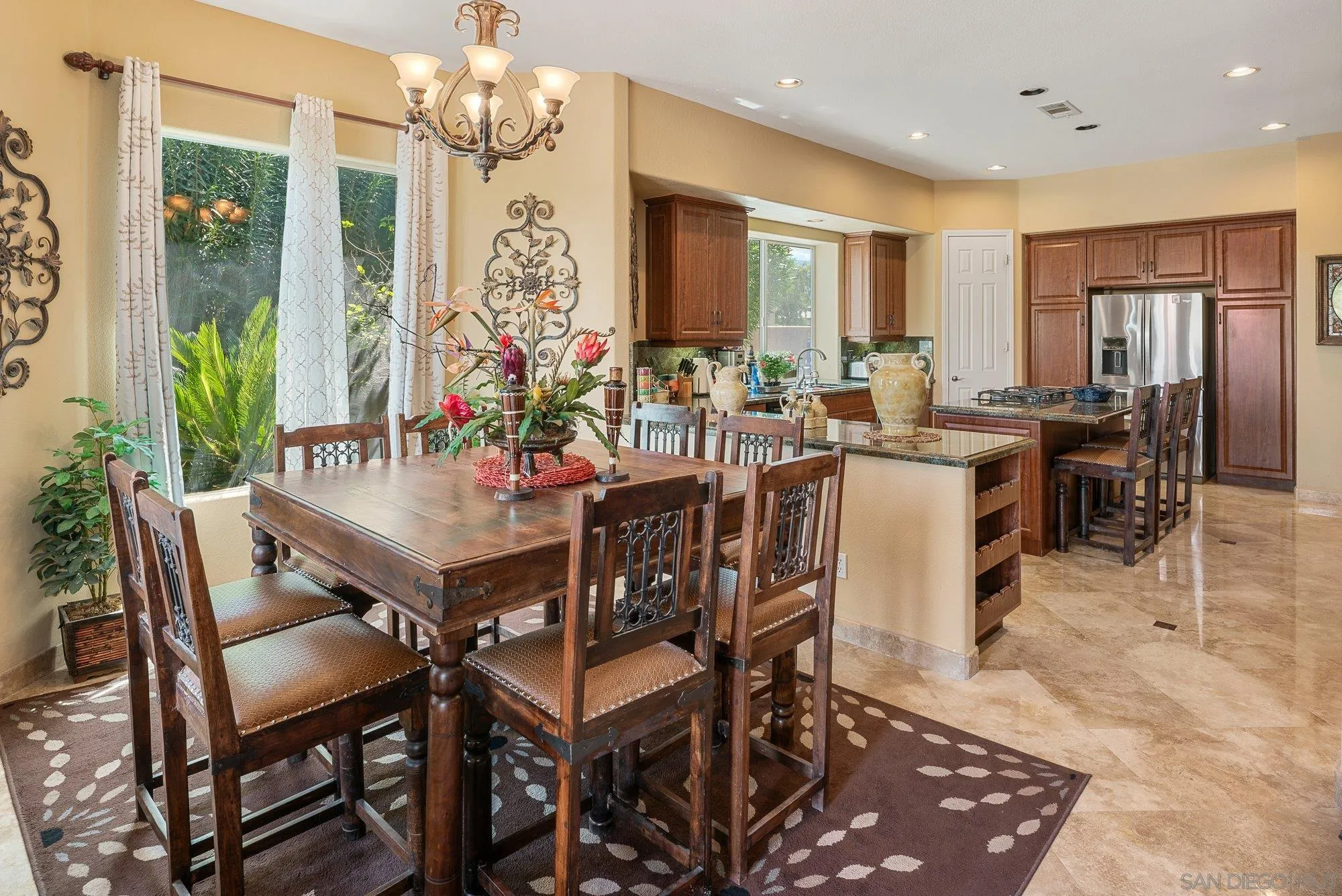 4 Chandon Court Rancho Mirage, CA 92270 - Photo 16 of 44 a view of a dining room with furniture window and outside view