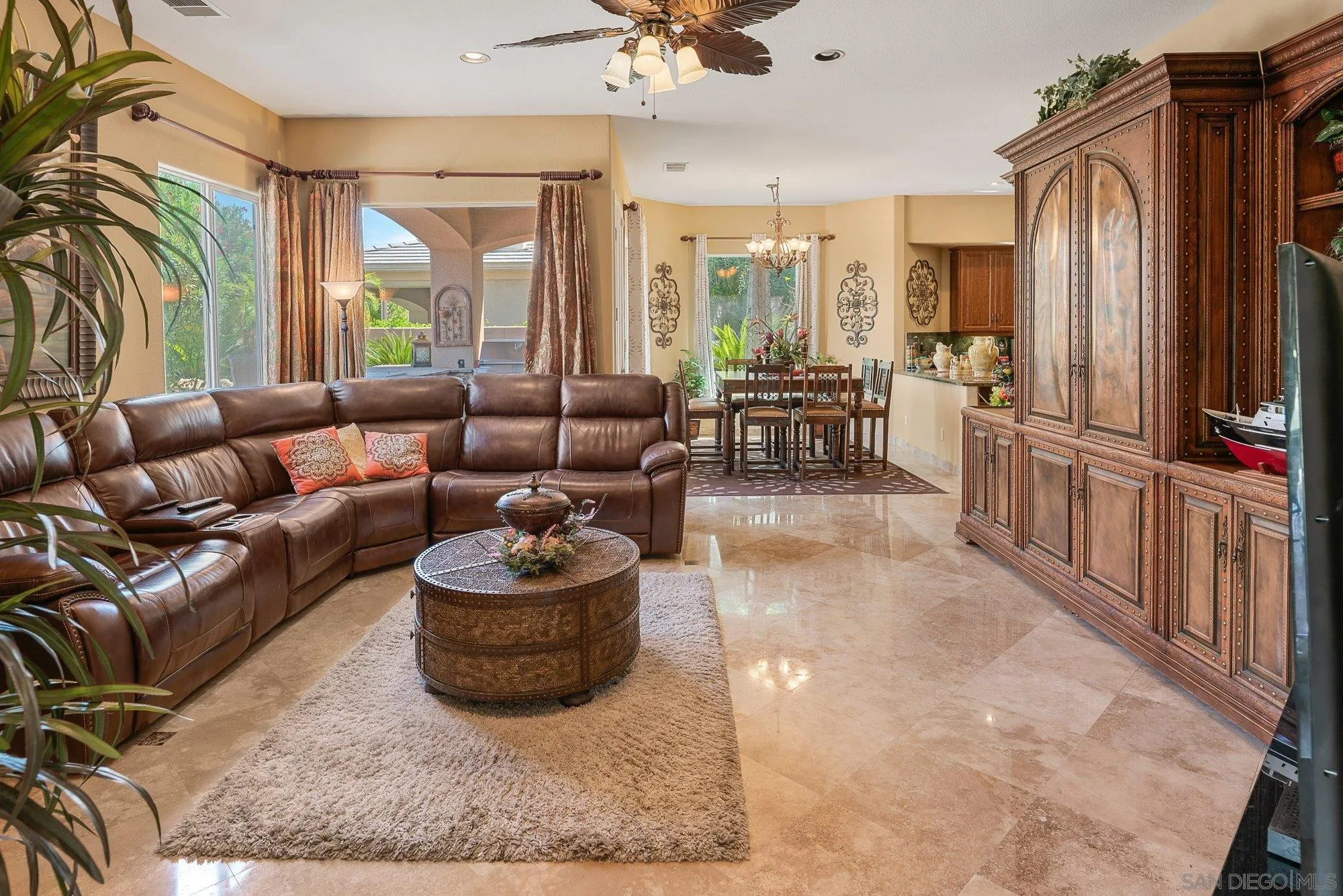 4 Chandon Court Rancho Mirage, CA 92270 - Photo 17 of 44 a living room with furniture and a large window