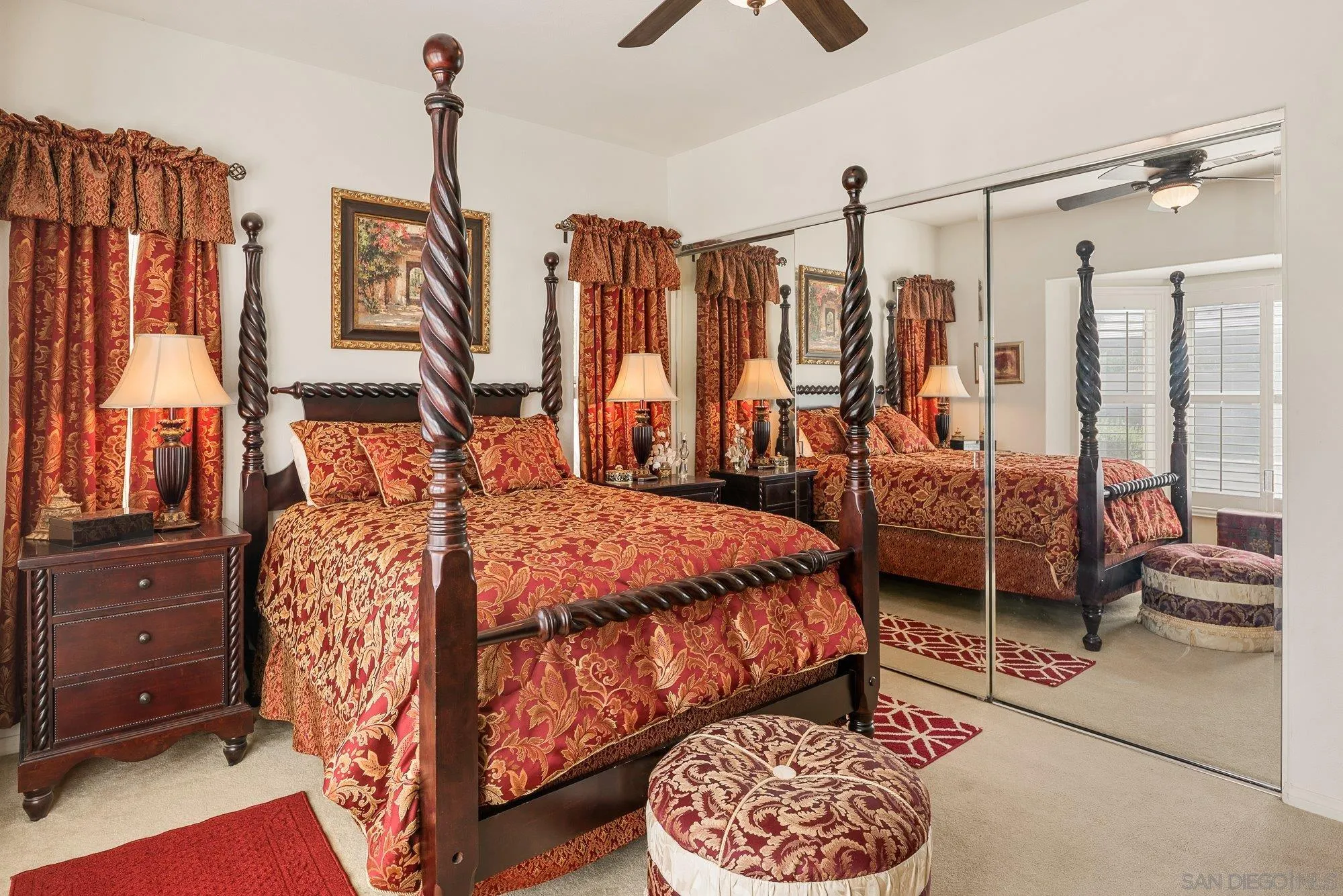 4 Chandon Court Rancho Mirage, CA 92270 - Photo 29 of 44 a bedroom with a bed a large window and walk in closet