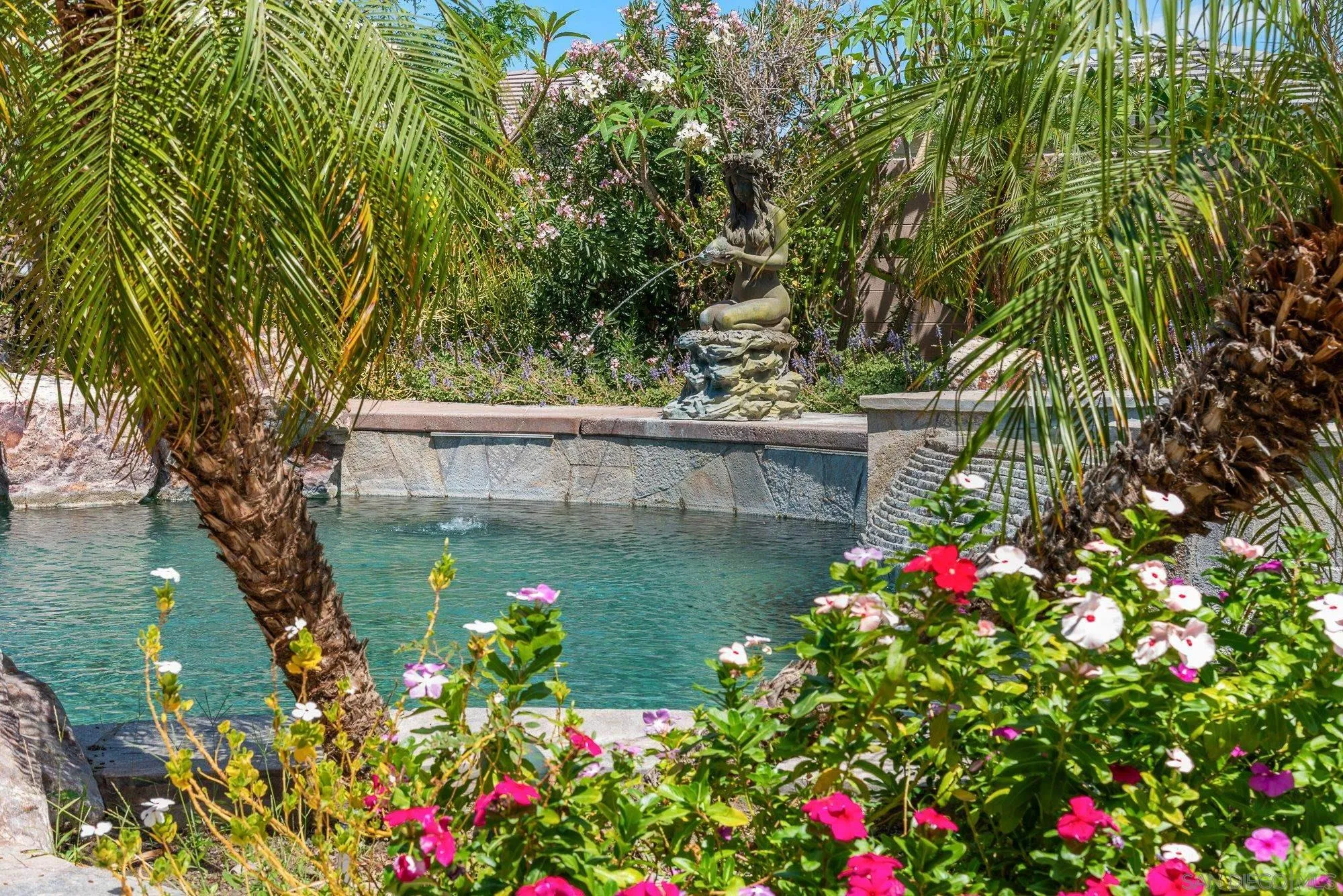 4 Chandon Court Rancho Mirage, CA 92270 - Photo 37 of 44 a view of a garden with plants