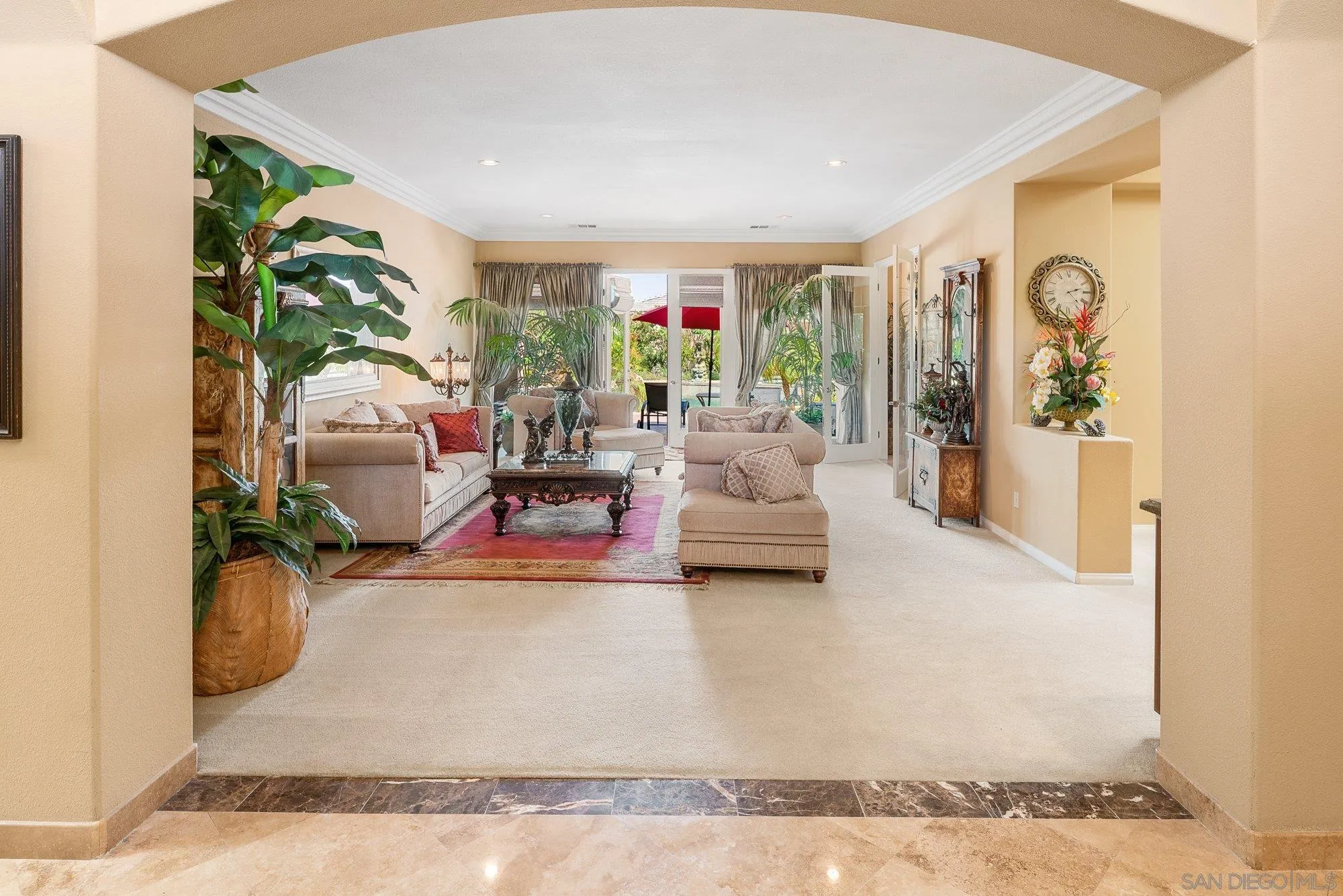 4 Chandon Court Rancho Mirage, CA 92270 - Photo 7 of 44 a living room with furniture rug and a dining table
