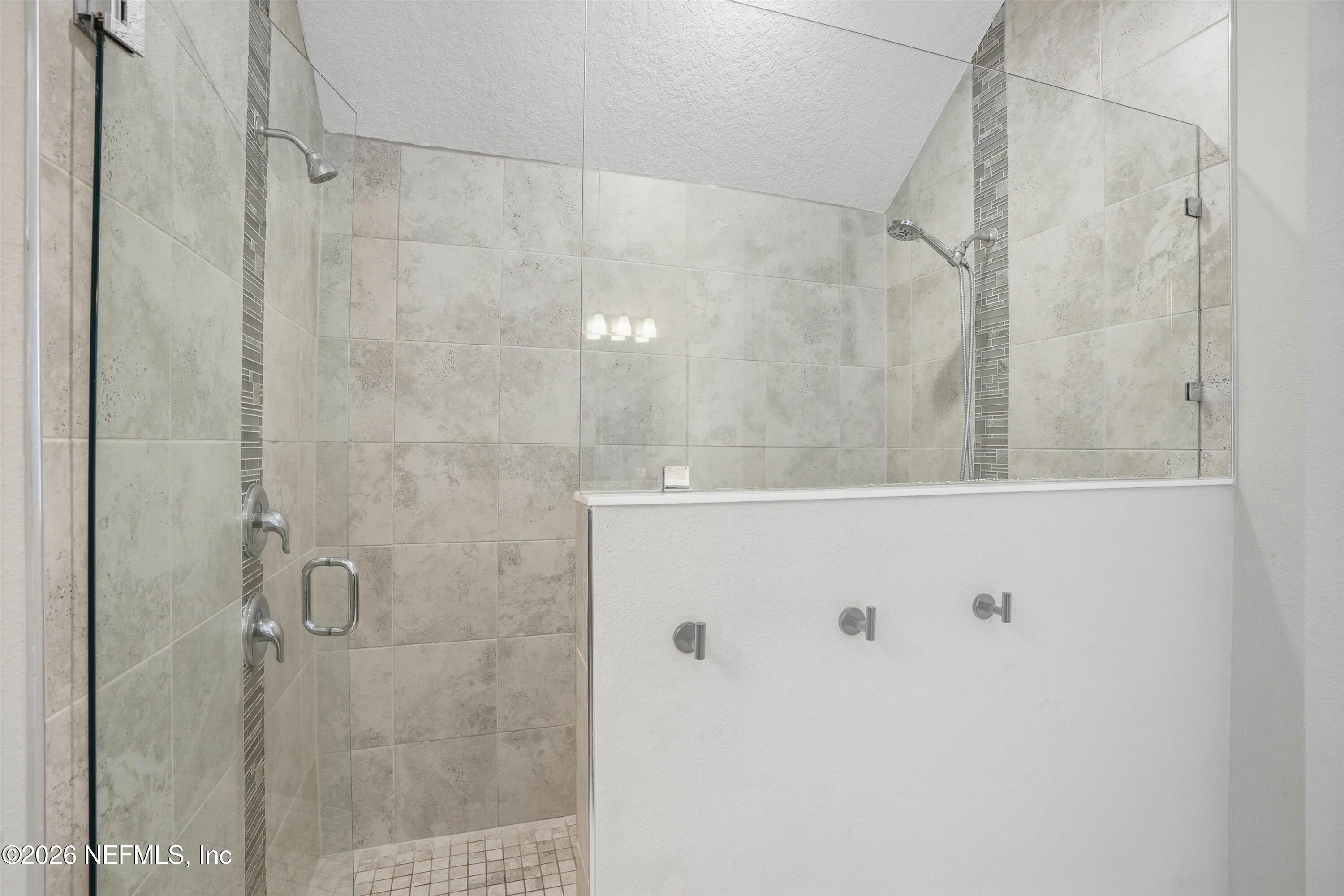 742 Sycamore Way Orange Park, FL 32073 - Photo 16 of 41 a bathroom with a shower