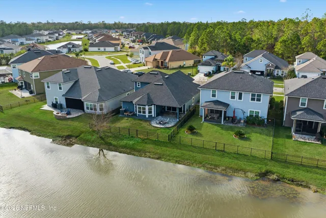 an aerial view of a house with a garden