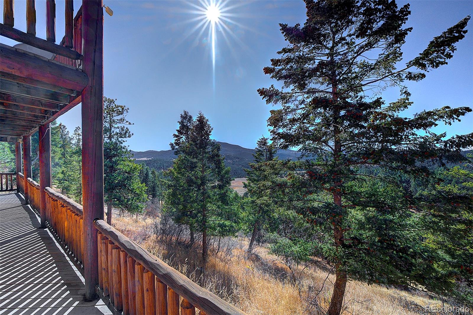 6561 Ridgeview Drive Morrison, CO 80465 - Photo 29 of 36 a view of a balcony with an outdoor space