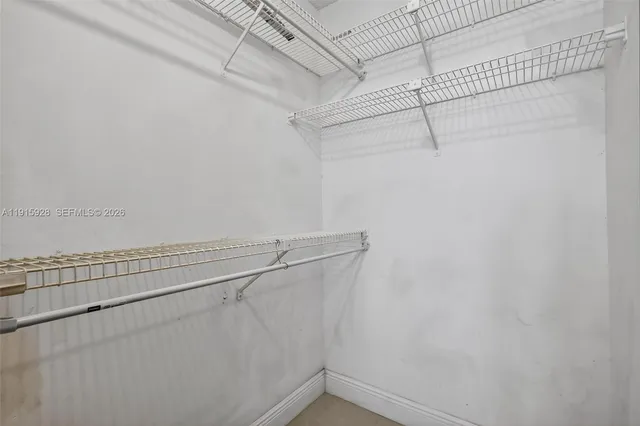 a view of a room with racks on the wall