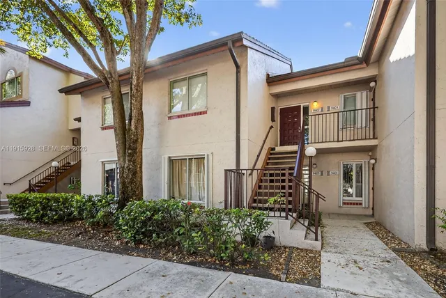 front view of a house with a small yard