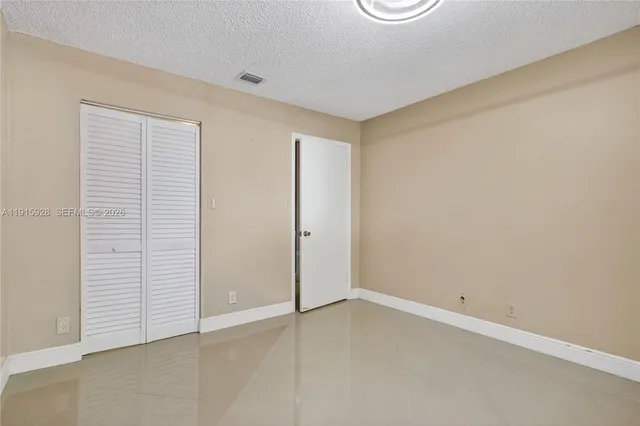 an empty room with closet