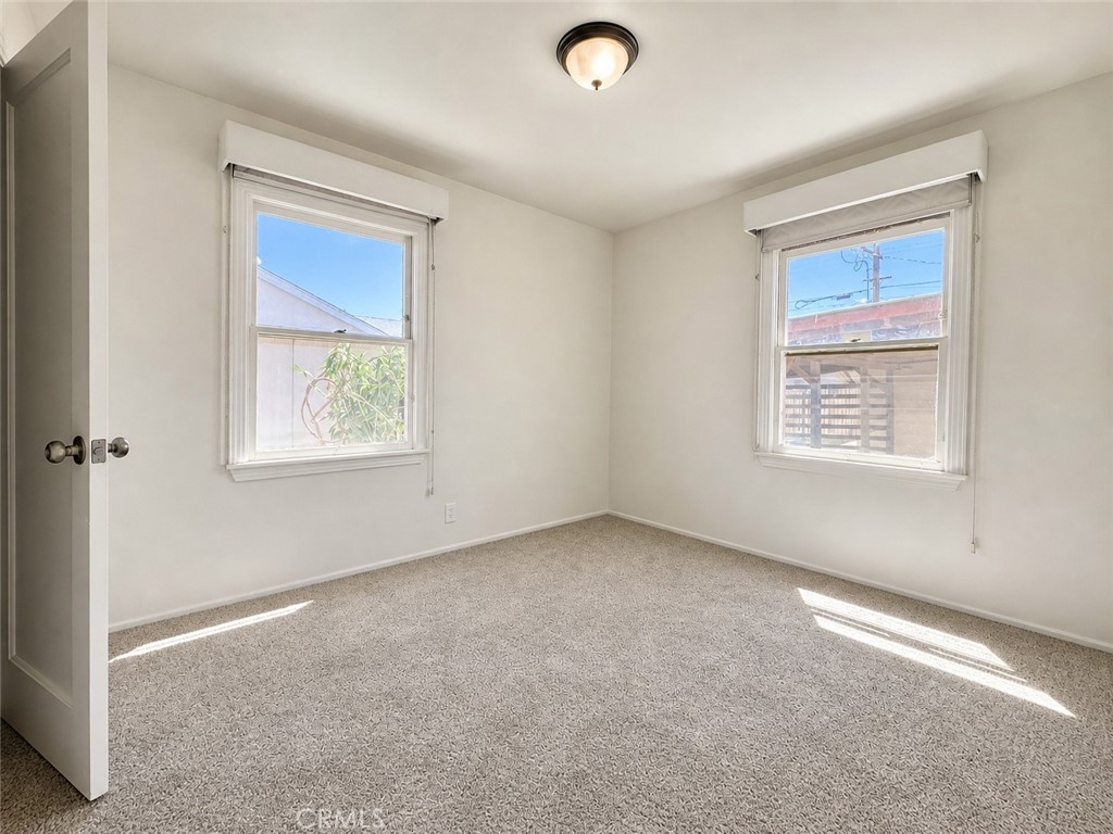 325 North Sanders Street Ridgecrest, CA 93555 - Photo 14 of 23 an empty room with a window