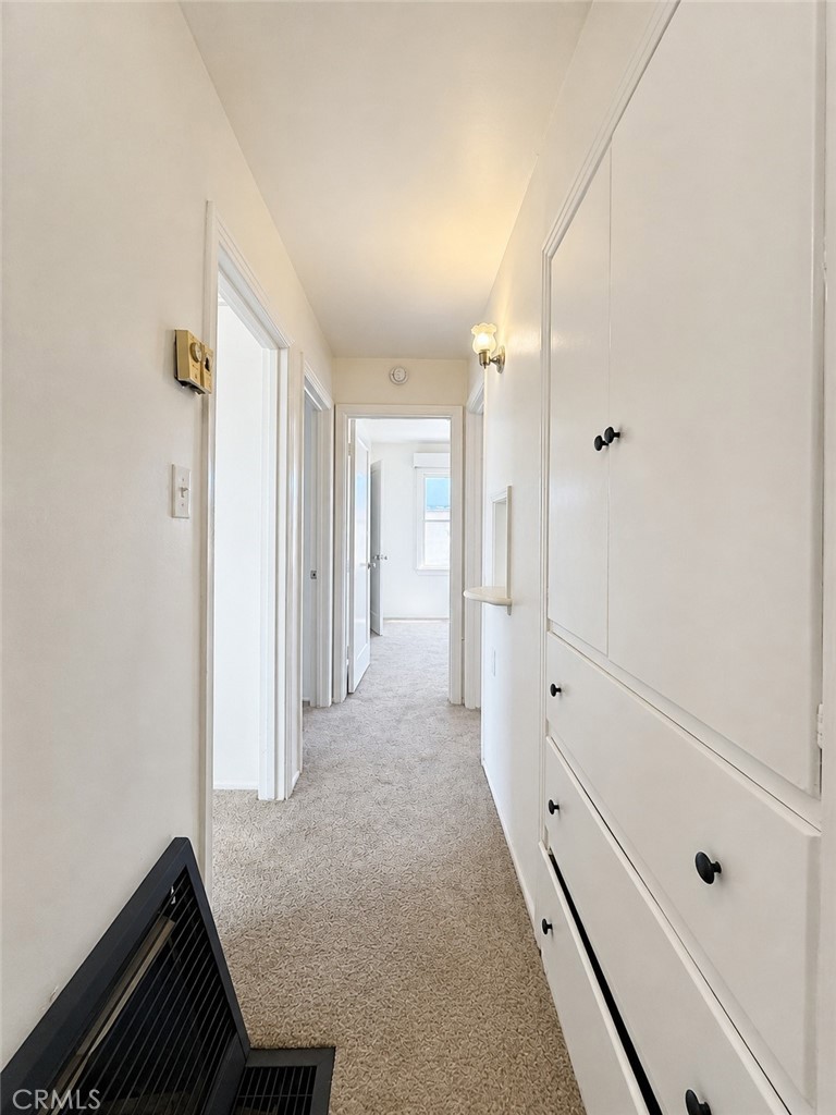 325 North Sanders Street Ridgecrest, CA 93555 - Photo 17 of 23 a view of a hallway with white walls