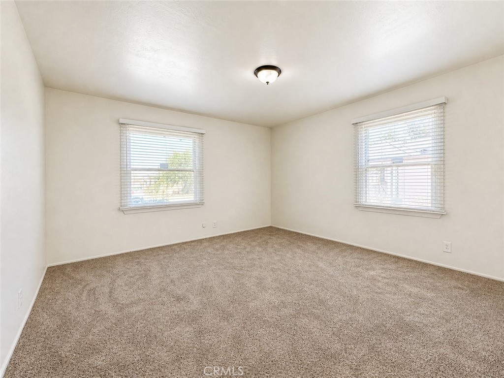 325 North Sanders Street Ridgecrest, CA 93555 - Photo 18 of 23 an empty room with a window