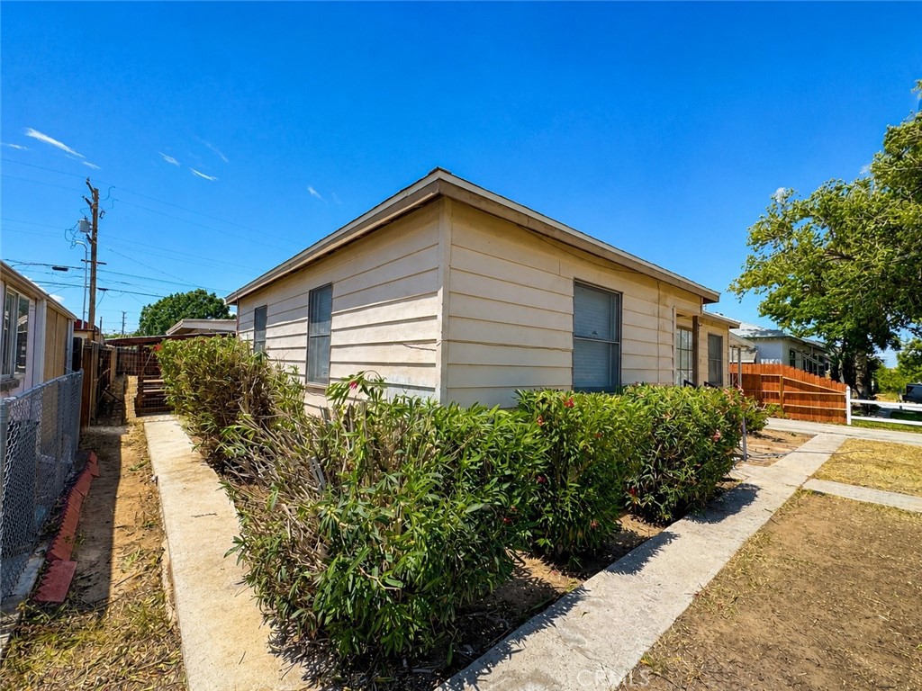 325 North Sanders Street Ridgecrest, CA 93555 - Photo 23 of 23 a view of a house with a yard