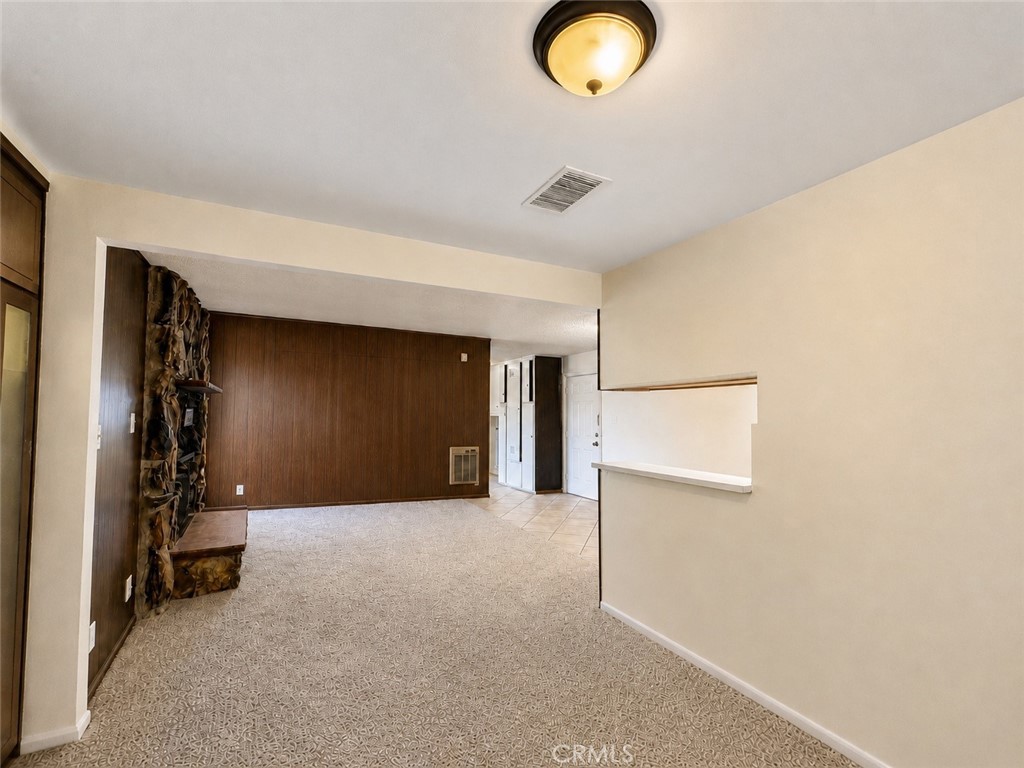 325 North Sanders Street Ridgecrest, CA 93555 - Photo 3 of 23 a view of a livingroom with a staircase