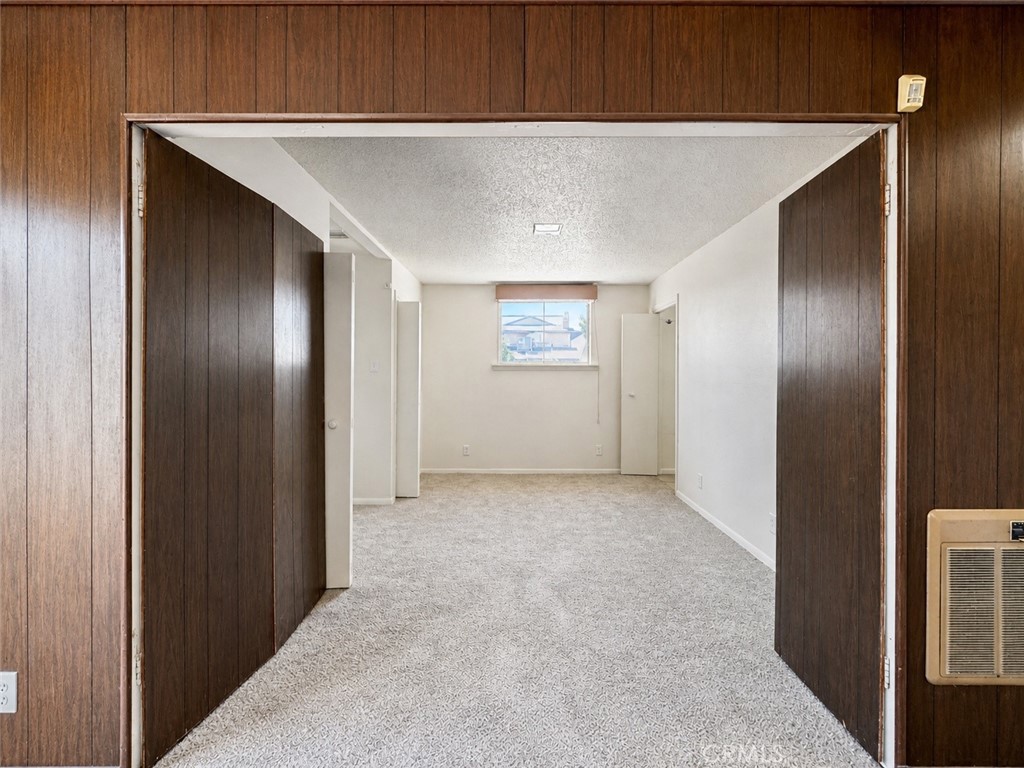 325 North Sanders Street Ridgecrest, CA 93555 - Photo 5 of 23 an empty room with windows and closet