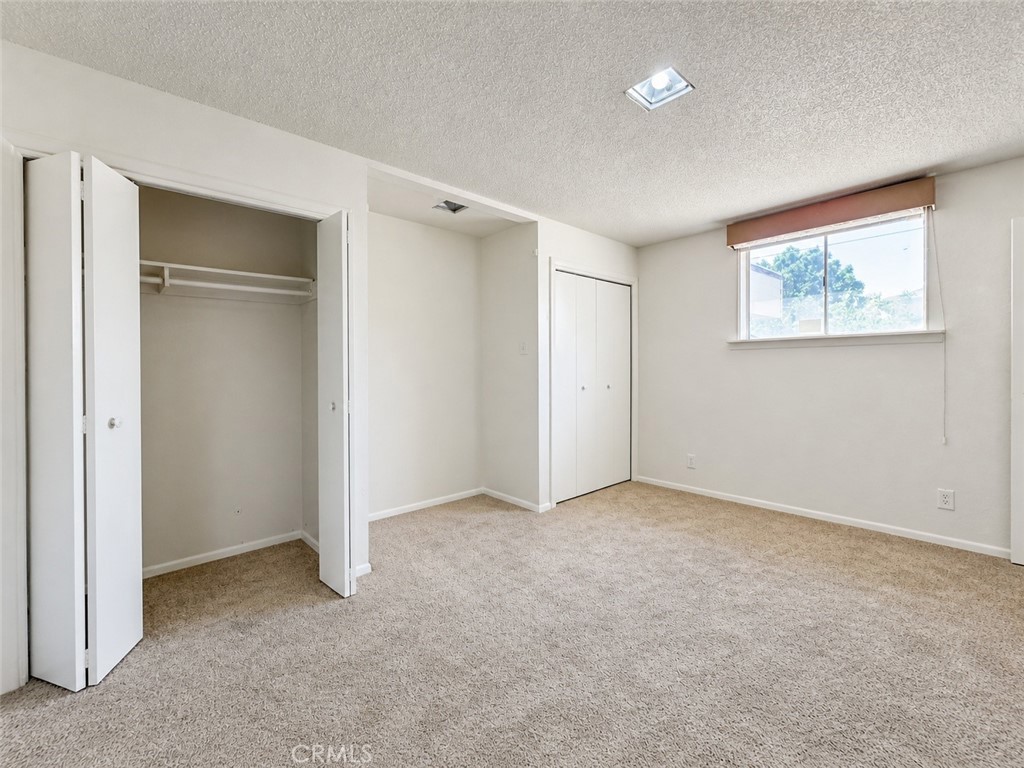 325 North Sanders Street Ridgecrest, CA 93555 - Photo 8 of 23 an empty room with a empty space