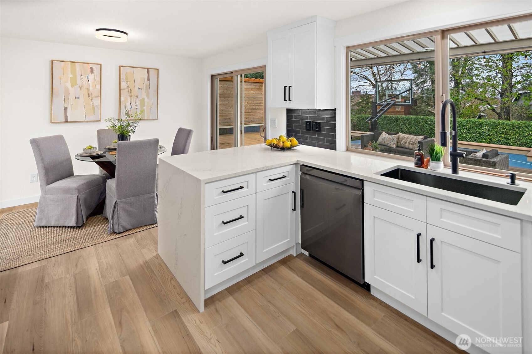 2219 236th Street Southeast Bothell, WA 98021 - Photo 13 of 34 a view of a kitchen with cabinets and wooden floor