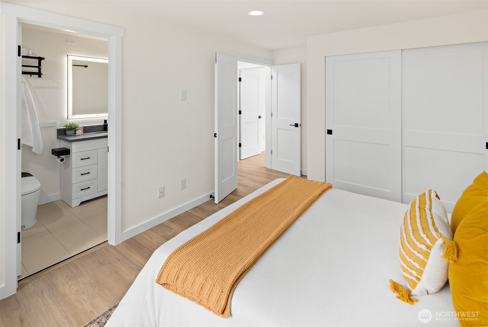 2219 236th Street Southeast Bothell, WA 98021 - Photo 15 of 34 a bedroom with a bed and teddy bear