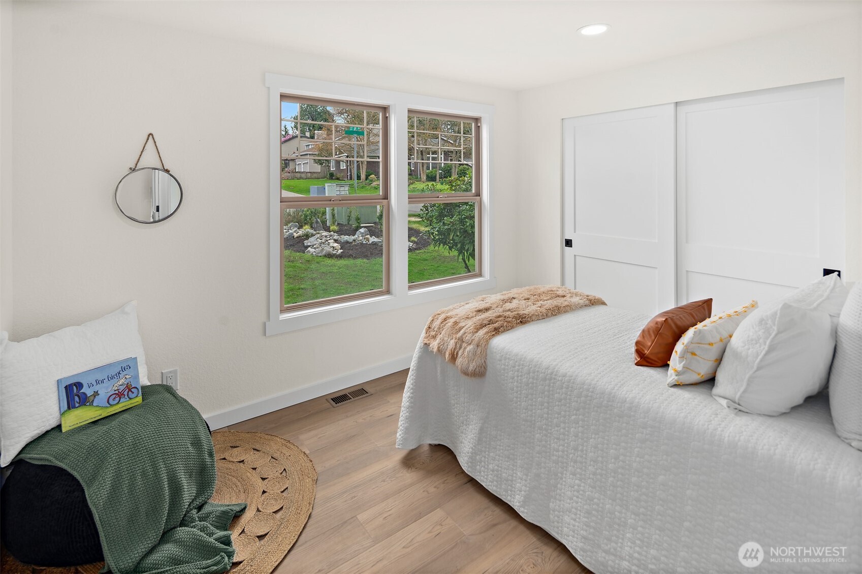 2219 236th Street Southeast Bothell, WA 98021 - Photo 17 of 34 a bedroom with a bed and a window