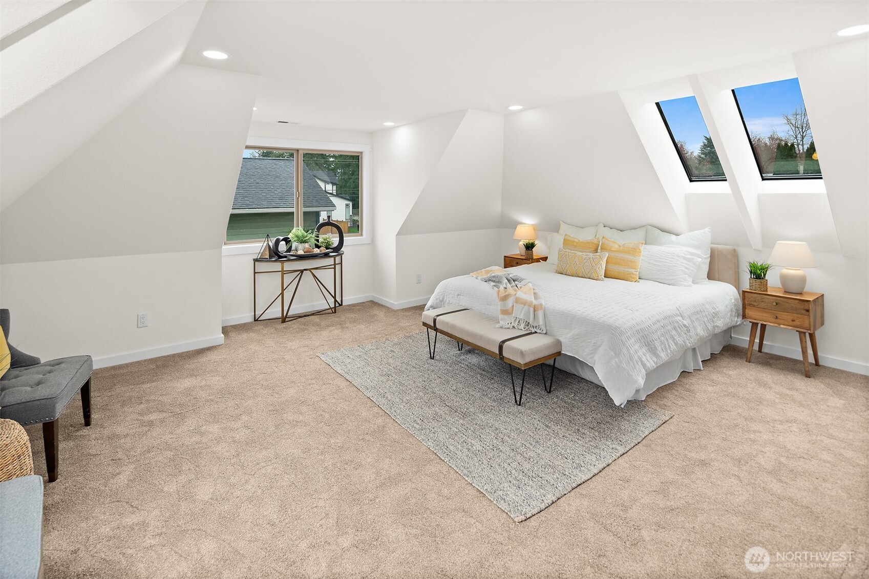 2219 236th Street Southeast Bothell, WA 98021 - Photo 18 of 34 a bedroom with a bed a chair and potted plant on table