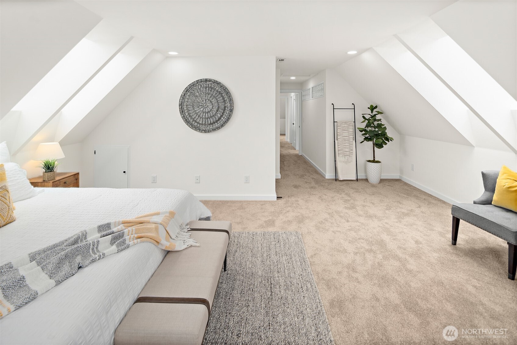 2219 236th Street Southeast Bothell, WA 98021 - Photo 19 of 34 a living room with furniture and a wall painting
