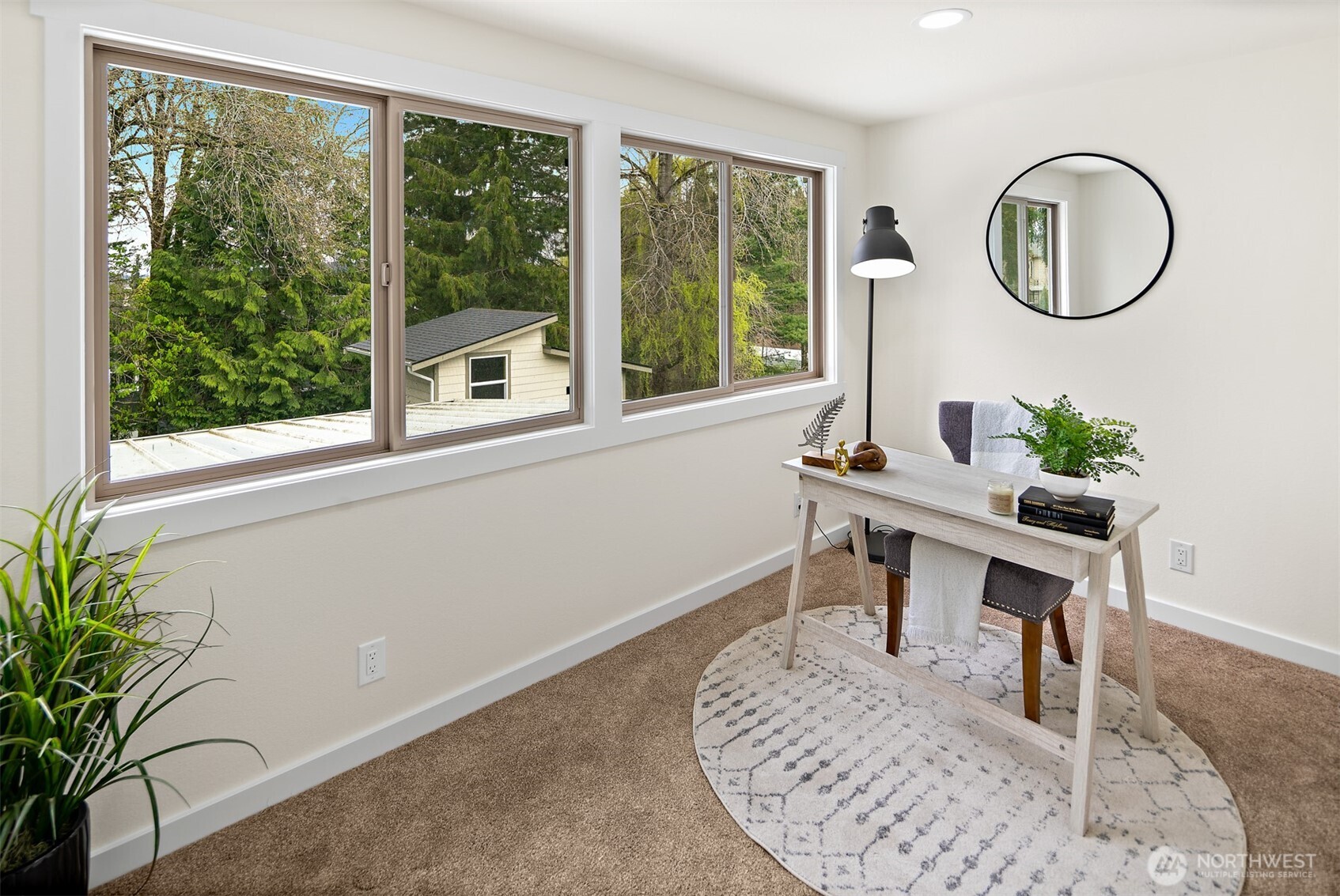 2219 236th Street Southeast Bothell, WA 98021 - Photo 22 of 34 a work room with furniture and a window