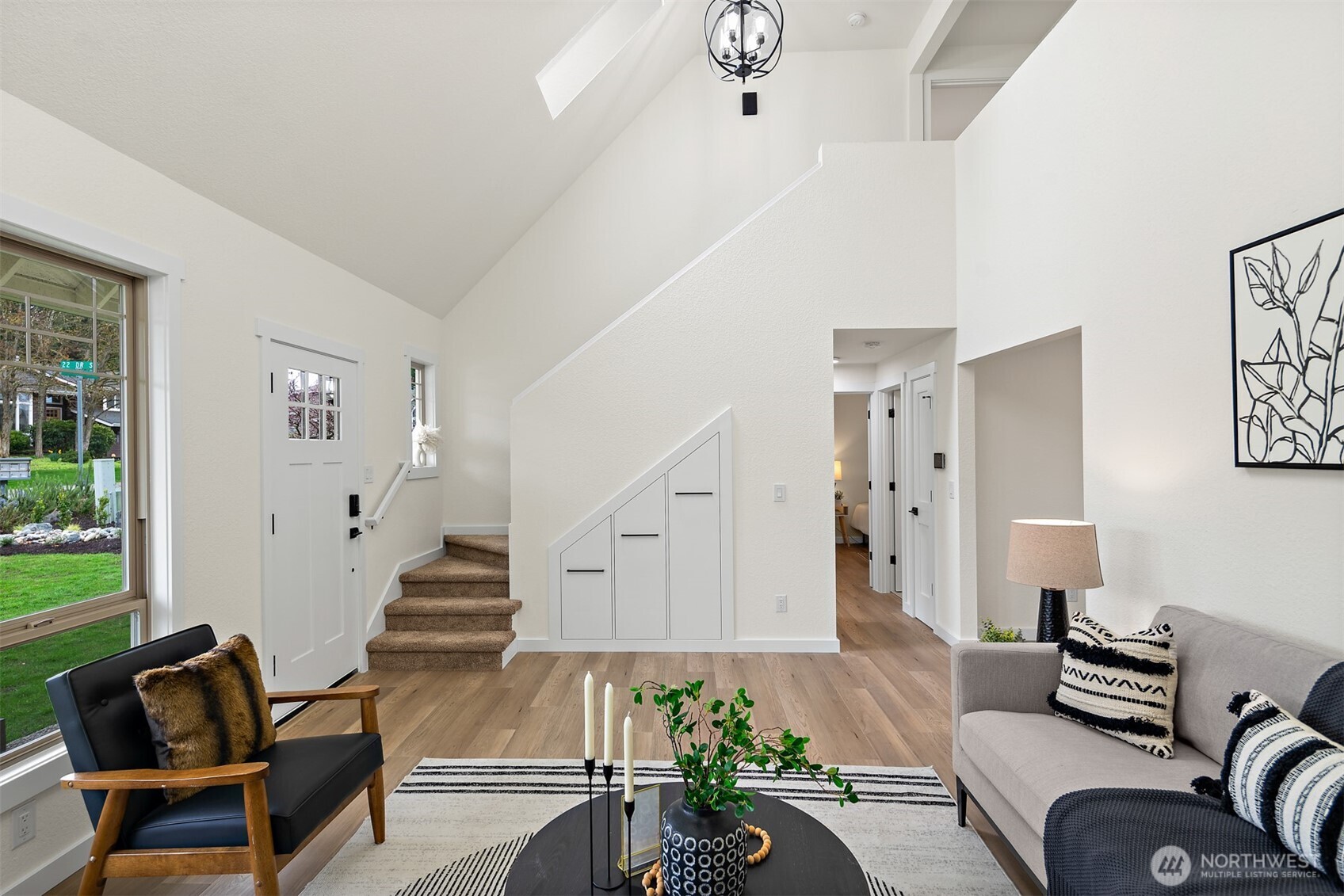 2219 236th Street Southeast Bothell, WA 98021 - Photo 7 of 34 a living room with furniture and wooden floor