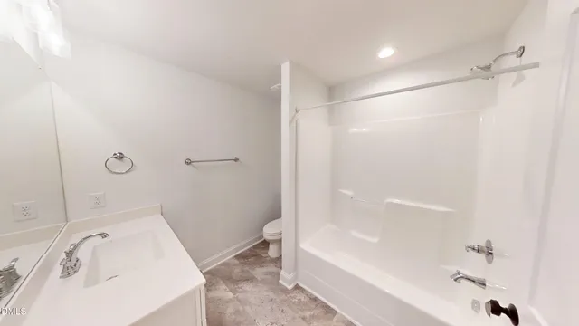 a bathroom with a sink and a tub