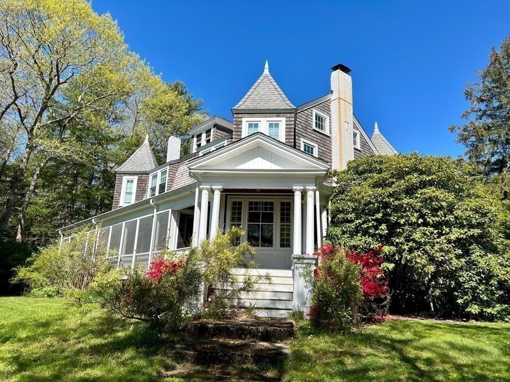 48 Neal Gate Street Scituate, MA 02066 - Photo 6 of 34 a front view of a house with garden