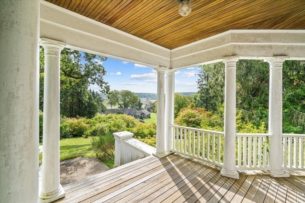 48 Neal Gate Street Scituate, MA 02066 - Photo 8 of 34 a view of a porch with wooden floor and outdoor space