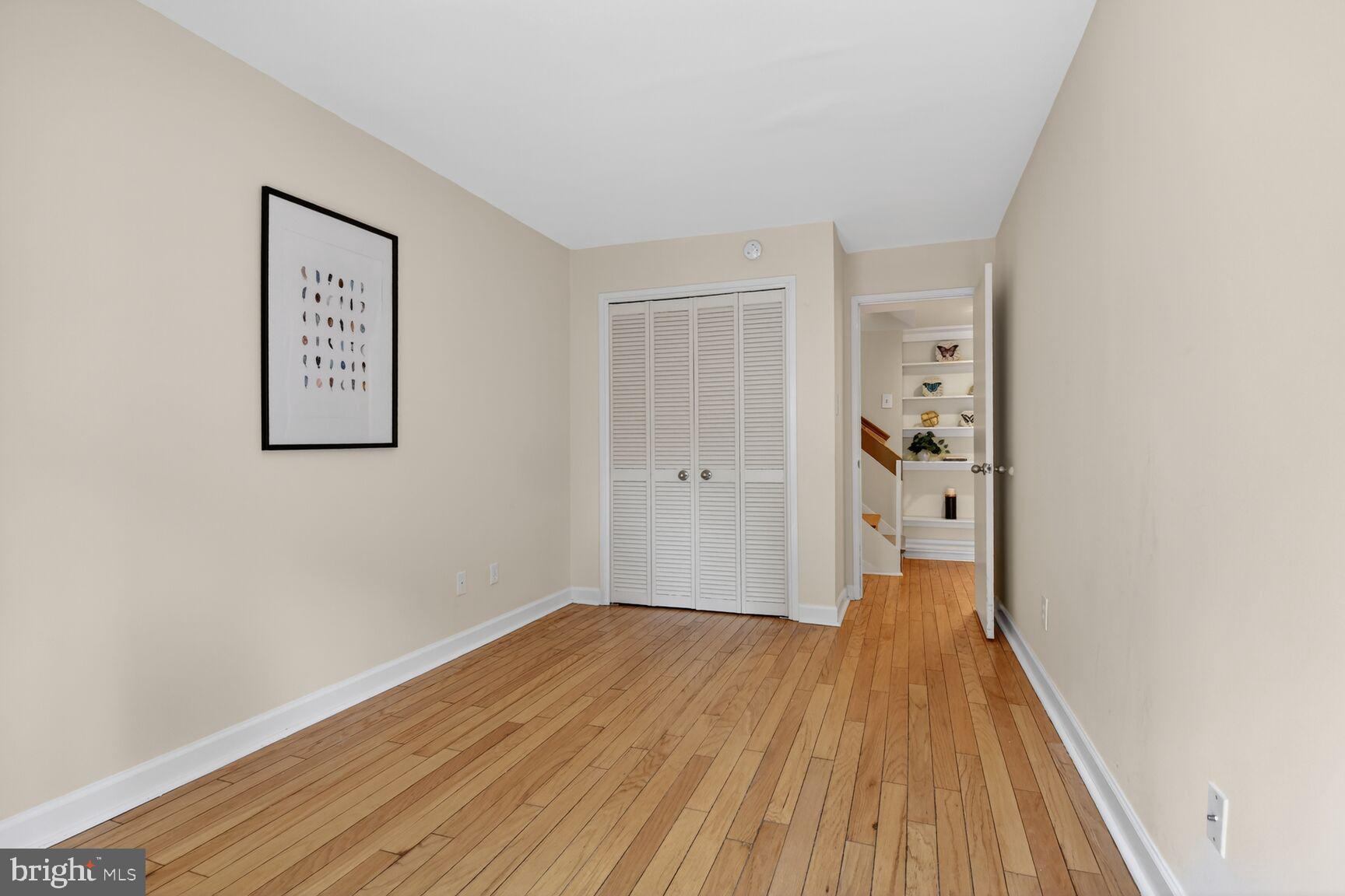 3225 Grace Street Northwest, Unit 101 Washington, DC 20007 - Photo 23 of 26 LOOKING FROM OUTDOOR SPACE INTO THE GUEST ROOM