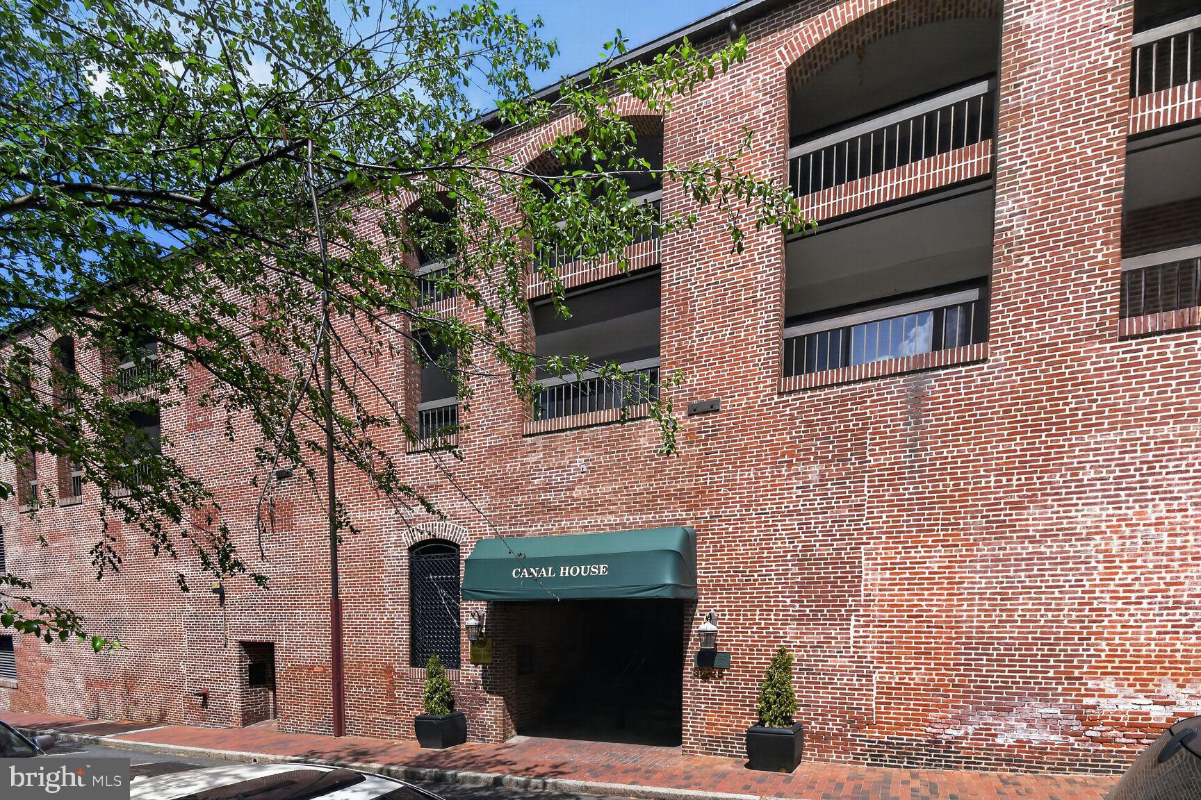 3225 Grace Street Northwest, Unit 101 Washington, DC 20007 - Photo 24 of 26 CANAL HOUSE FACING GRACE ST ONLY 35 CONDO'S