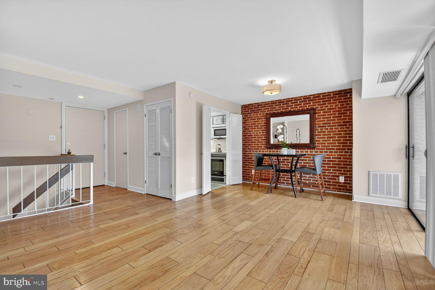 3225 Grace Street Northwest, Unit 101 Washington, DC 20007 - Photo 5 of 26 ENTRANCE TO CONDO STEP TO LOWER LEVEL