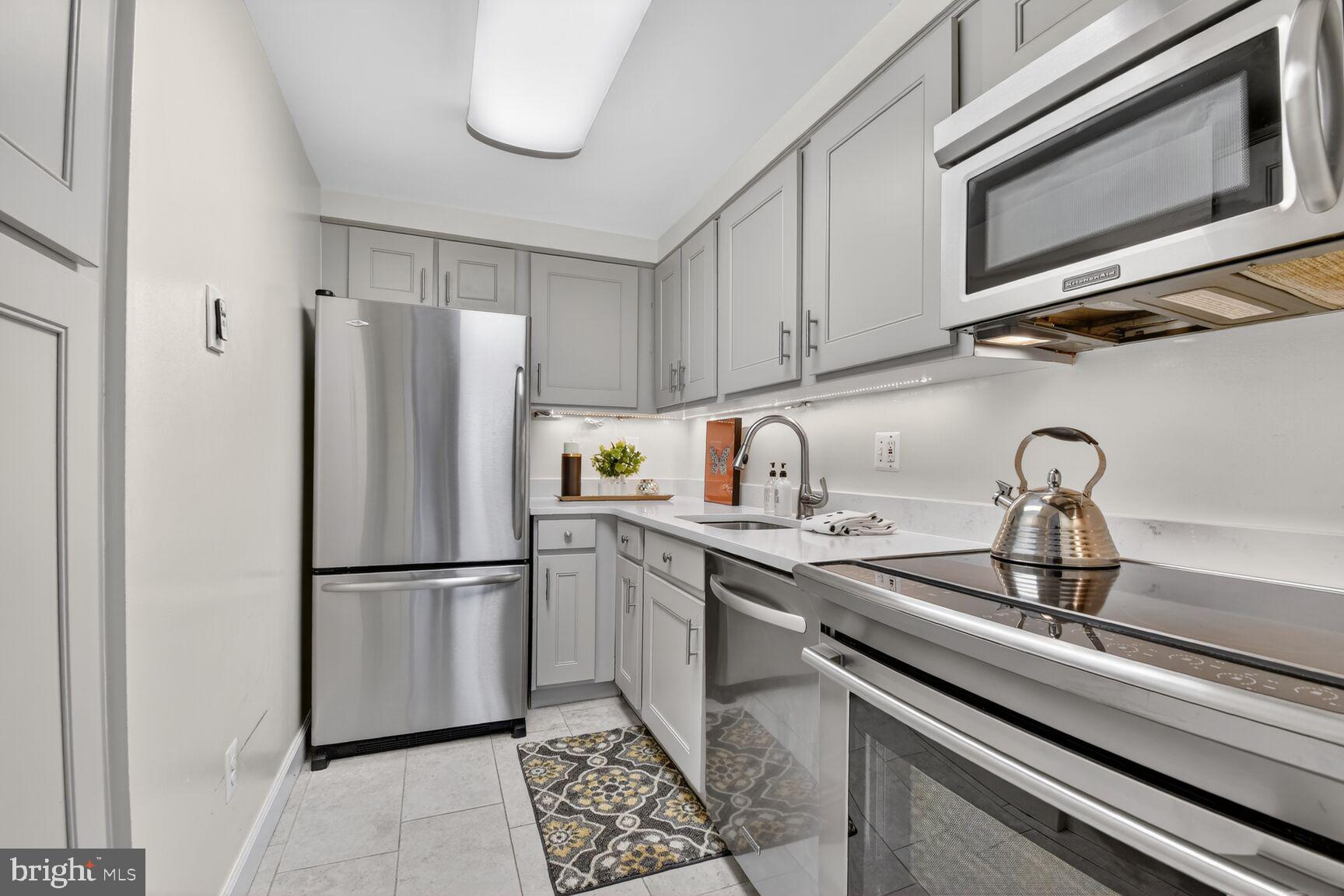 3225 Grace Street Northwest, Unit 101 Washington, DC 20007 - Photo 8 of 26 VIEW FROM ENTRANCE TO KITCHEN