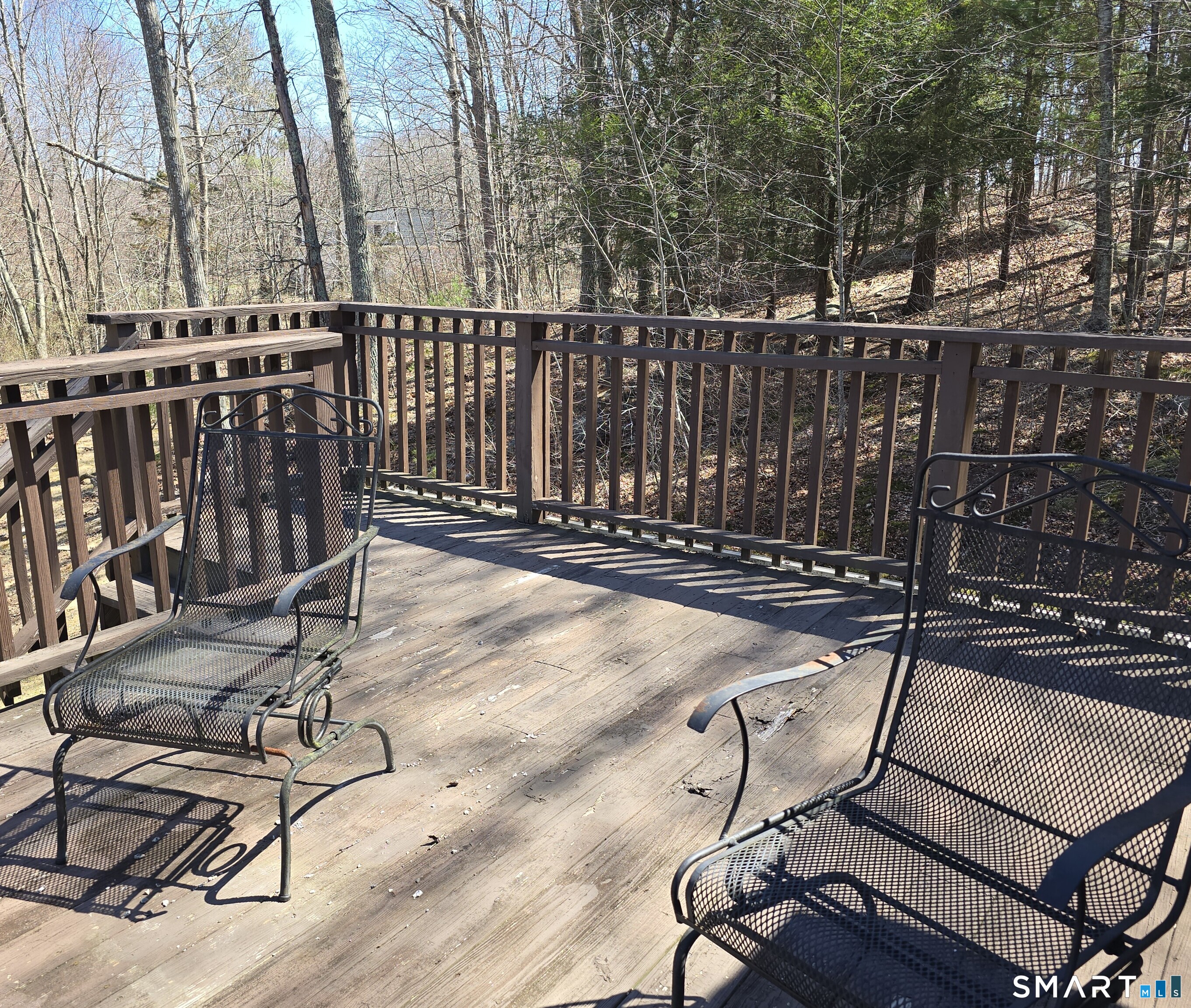 34 Country Club Drive Ledyard, CT 06339 - Photo 18 of 21 a view of a chairs and tables in the patio