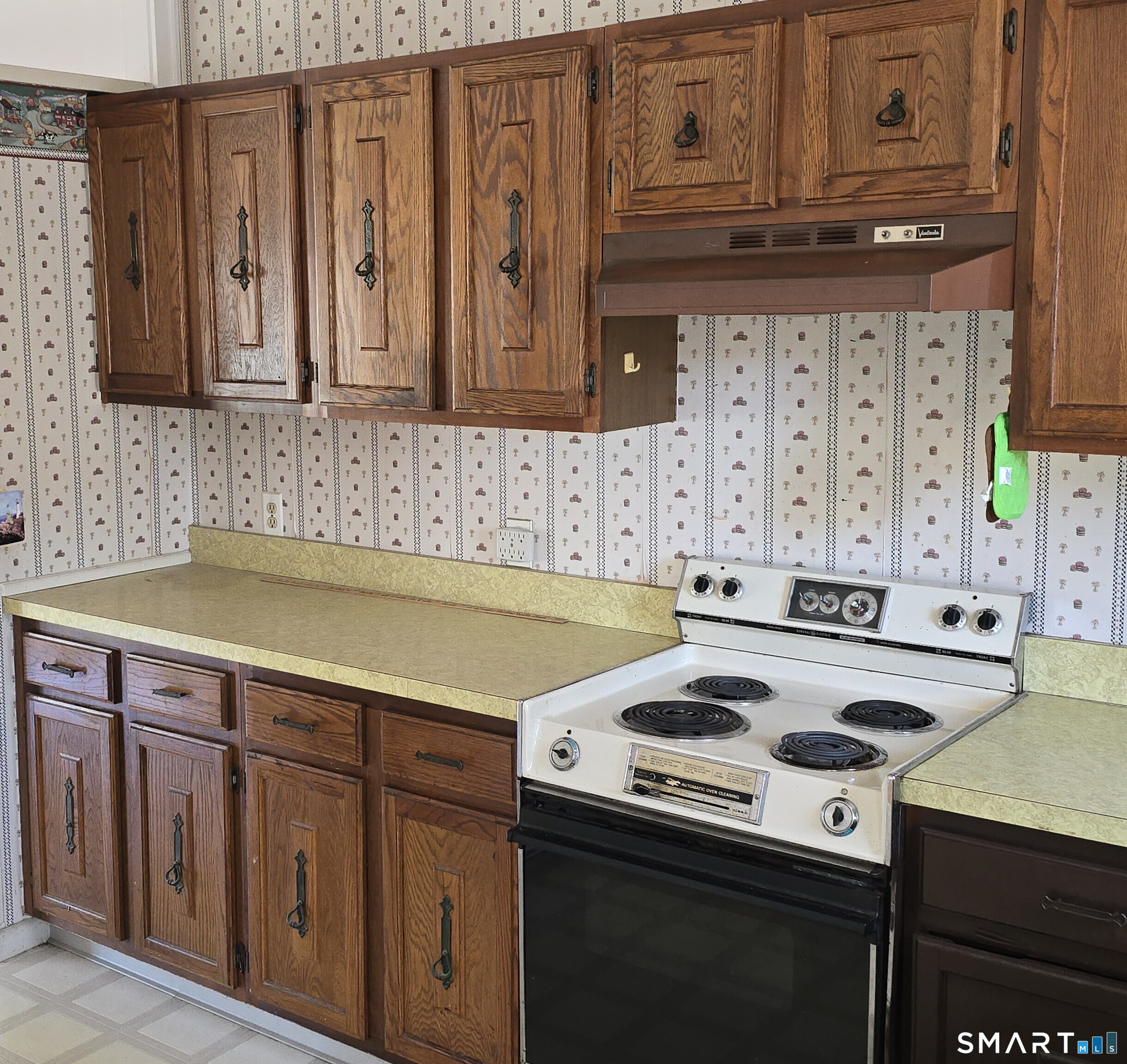 34 Country Club Drive Ledyard, CT 06339 - Photo 7 of 21 a kitchen with stainless steel appliances granite countertop a sink stove and cabinets