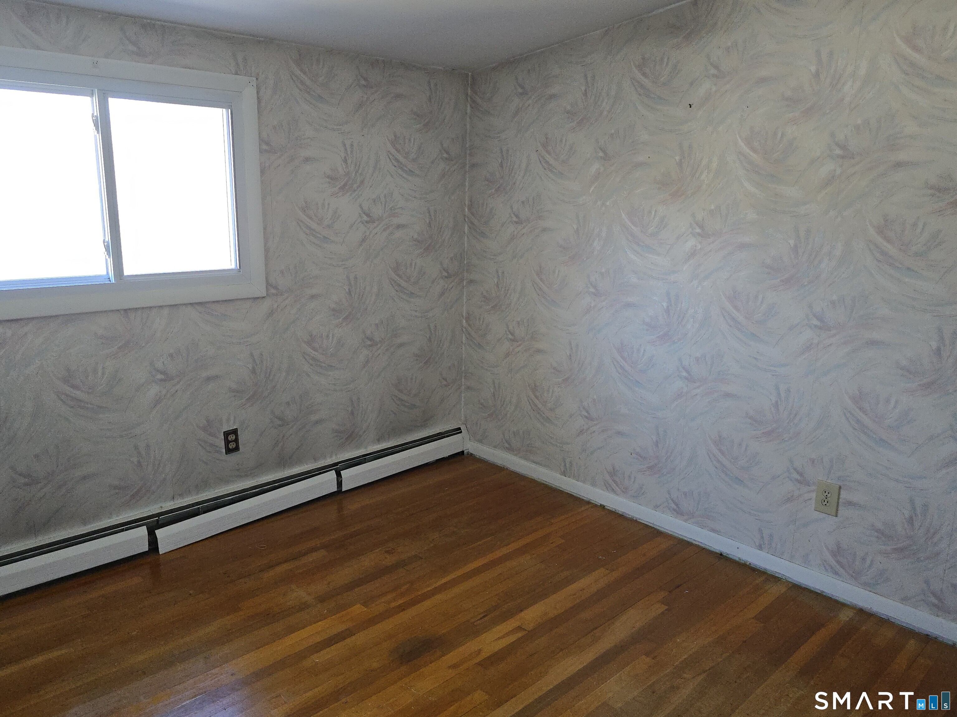 34 Country Club Drive Ledyard, CT 06339 - Photo 10 of 21 a view of a room with wooden floor and window