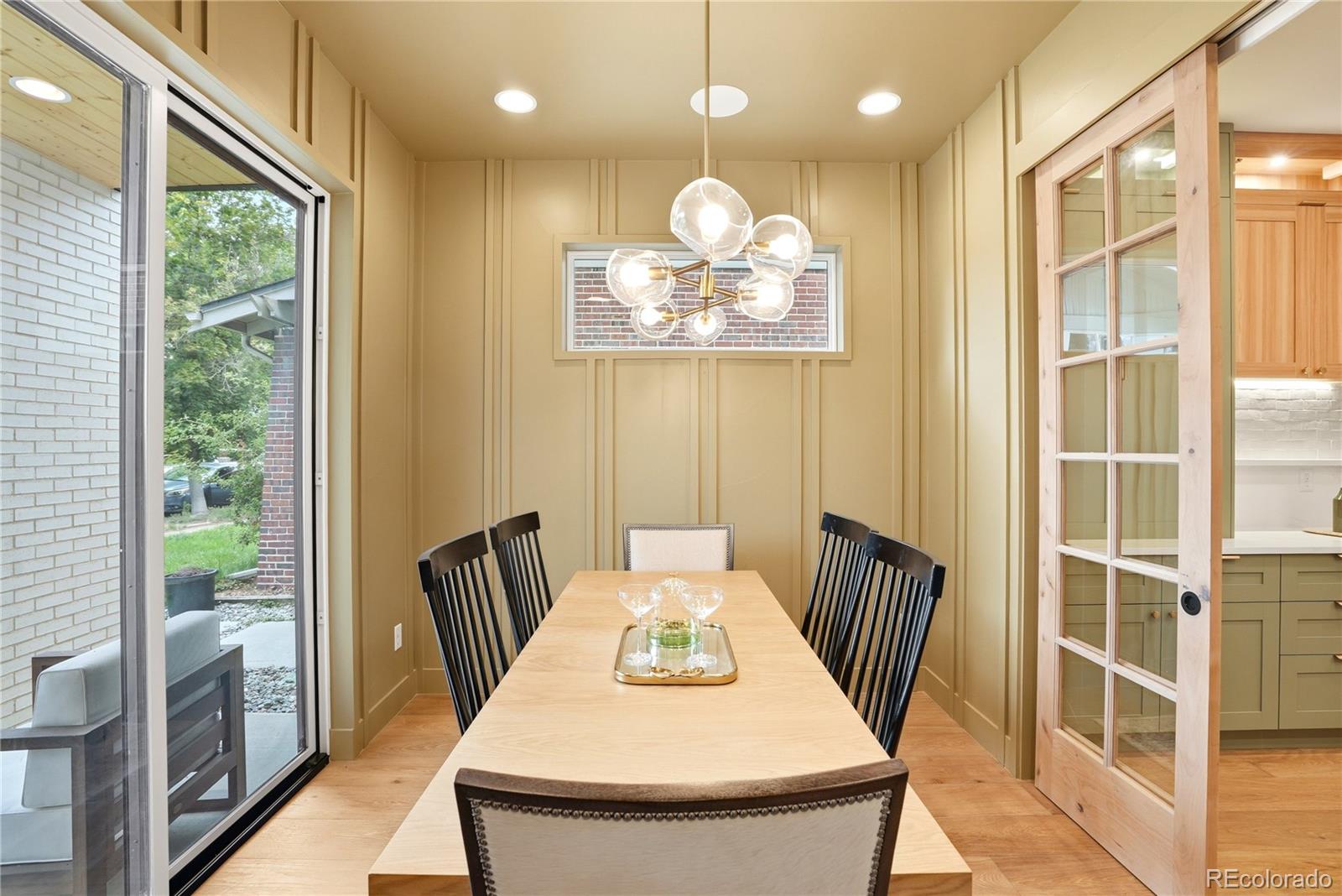 245 South Emerson Street Denver, CO 80209 - Photo 12 of 49 a view of a dining room with furniture window and wooden floor