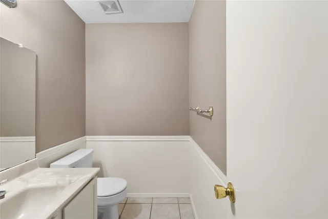 a bathroom with a sink and toilet