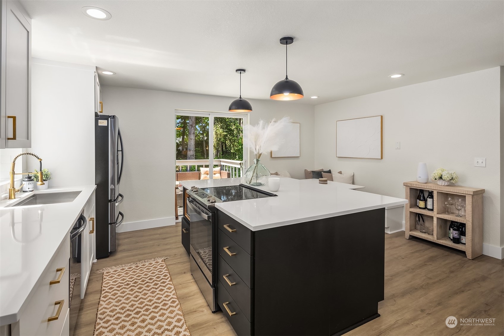 18216 19th Drive Southeast Bothell, WA 98012 - Photo 11 of 33 a kitchen with a sink stove and refrigerator