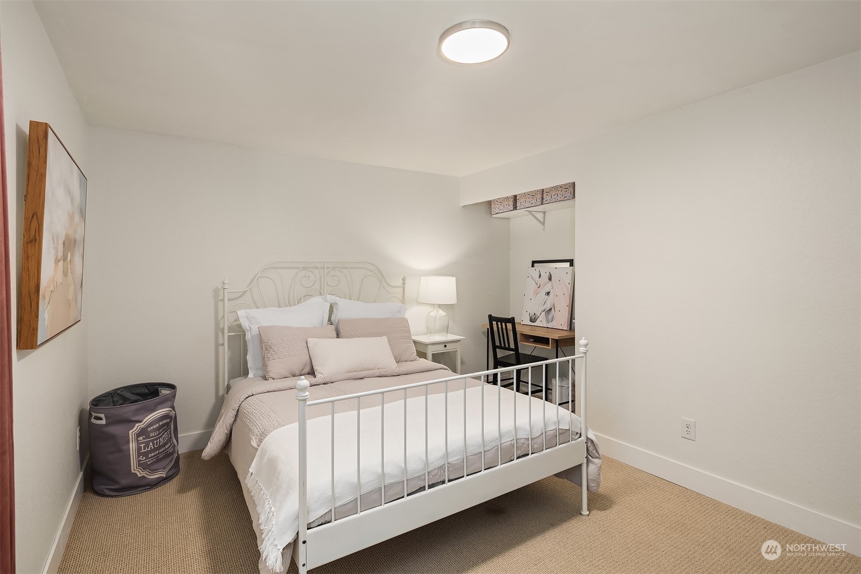 18216 19th Drive Southeast Bothell, WA 98012 - Photo 18 of 33 a bedroom with a bed and a chair