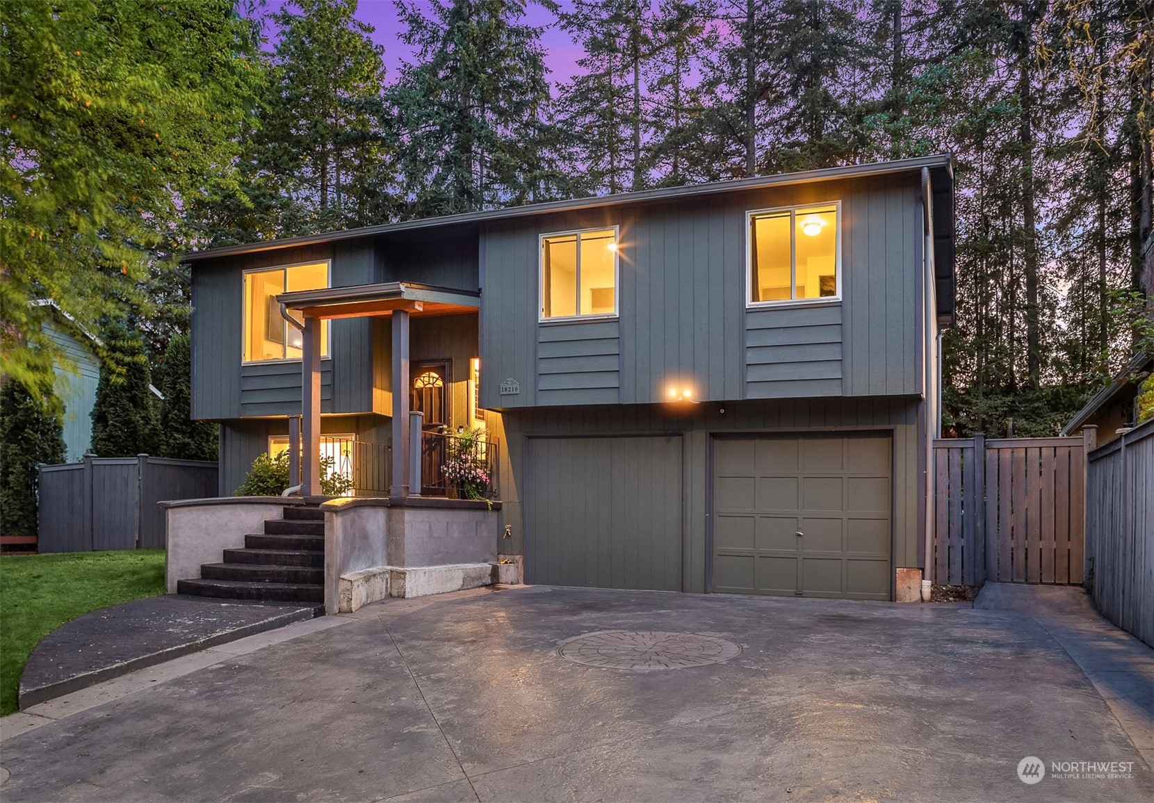 18216 19th Drive Southeast Bothell, WA 98012 - Photo 2 of 33 a front view of a house with a yard and garage