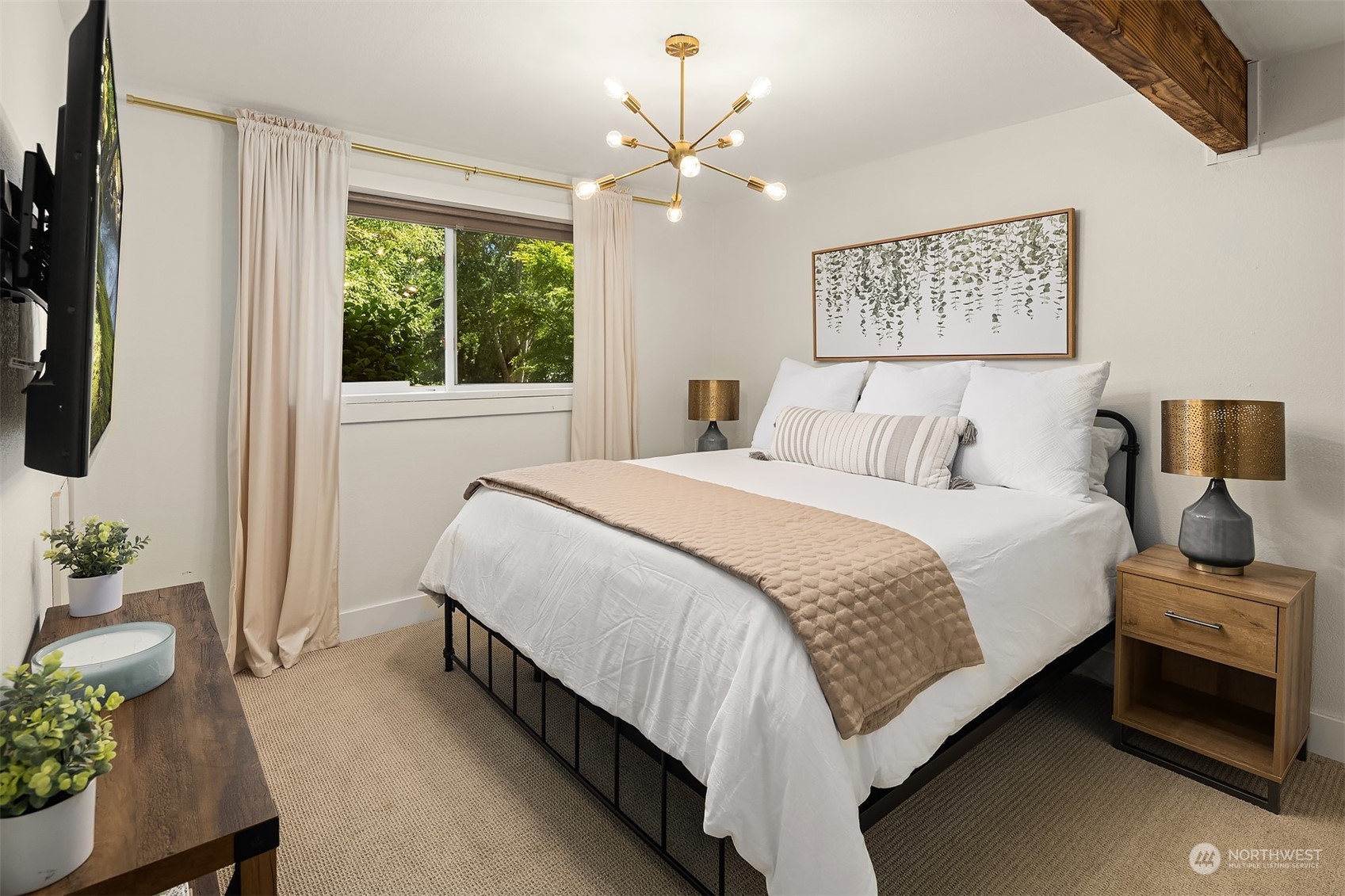 18216 19th Drive Southeast Bothell, WA 98012 - Photo 22 of 33 a bedroom with bed and a chandelier