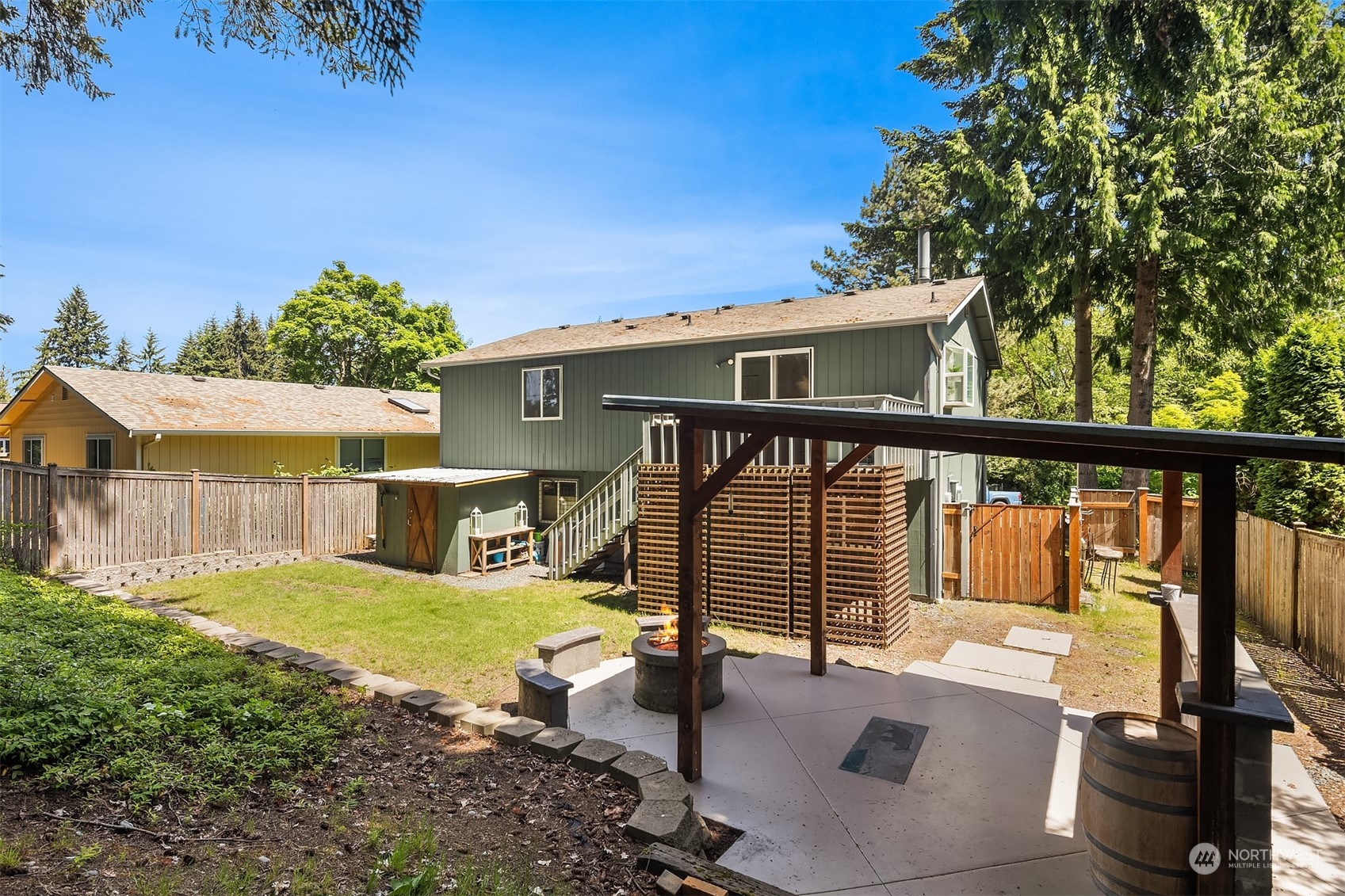 18216 19th Drive Southeast Bothell, WA 98012 - Photo 26 of 33 a view of a house with backyard and sitting area