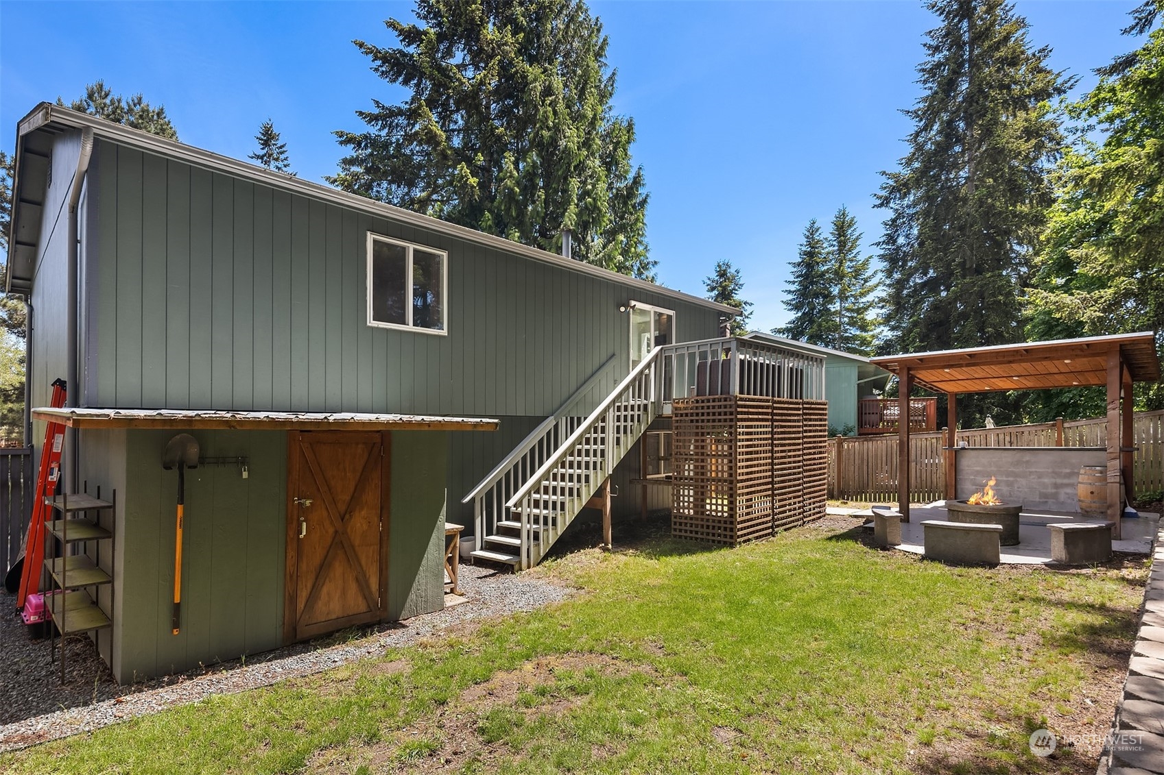 18216 19th Drive Southeast Bothell, WA 98012 - Photo 27 of 33 a view of a house with backyard and sitting area