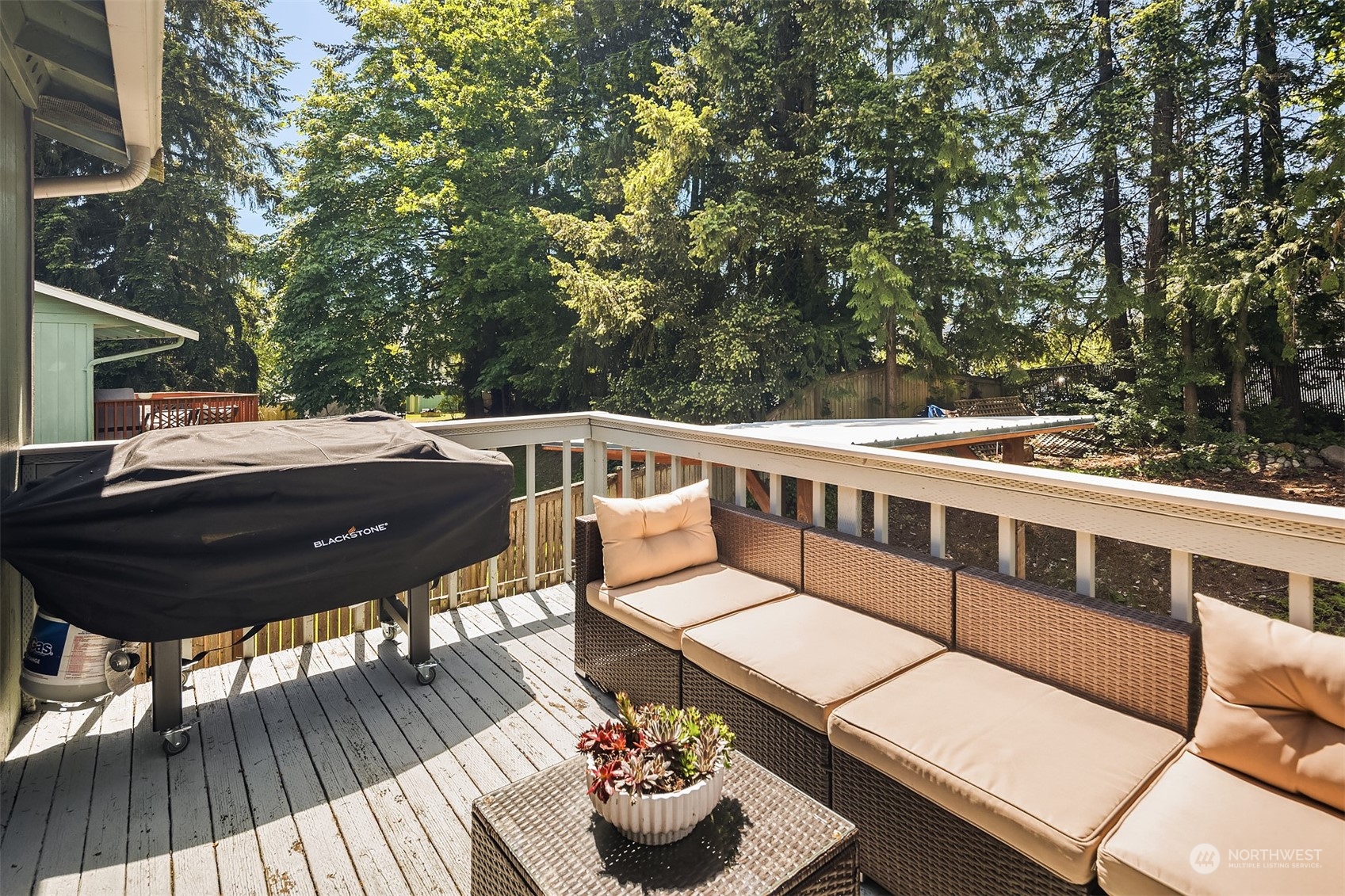 18216 19th Drive Southeast Bothell, WA 98012 - Photo 29 of 33 a view of a balcony with two chairs and a table