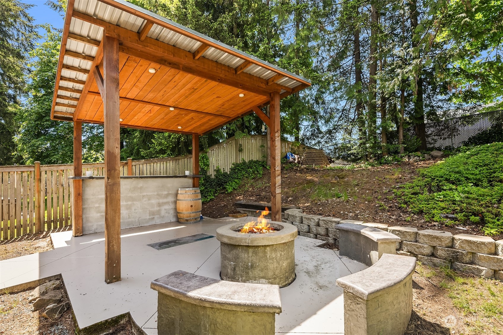 18216 19th Drive Southeast Bothell, WA 98012 - Photo 30 of 33 a view of a patio with couches chairs and a potted plant