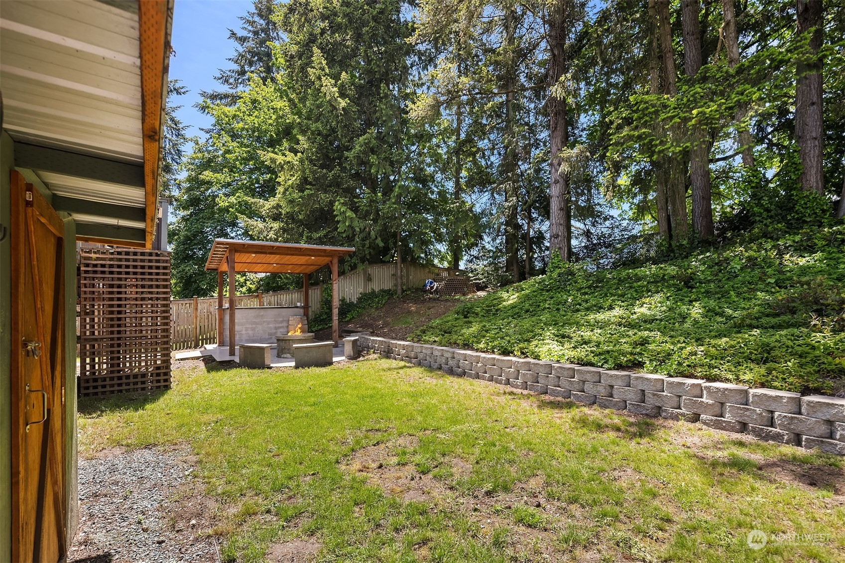 18216 19th Drive Southeast Bothell, WA 98012 - Photo 32 of 33 a view of a lounge chair and table in the patio
