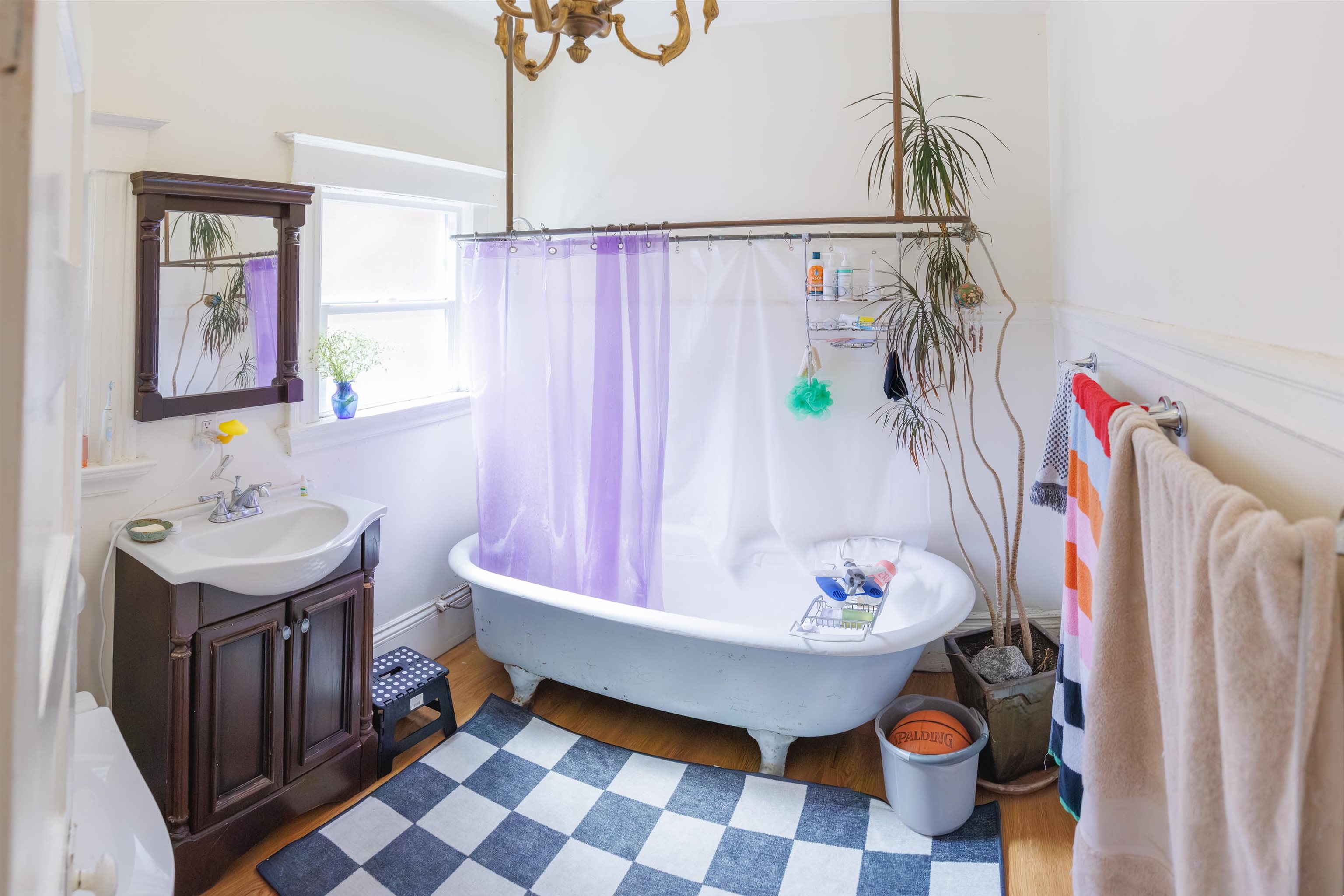 667 10th Street Oakland, CA 94607 - Photo 16 of 18 Full bath with vanity and light wood-style floors